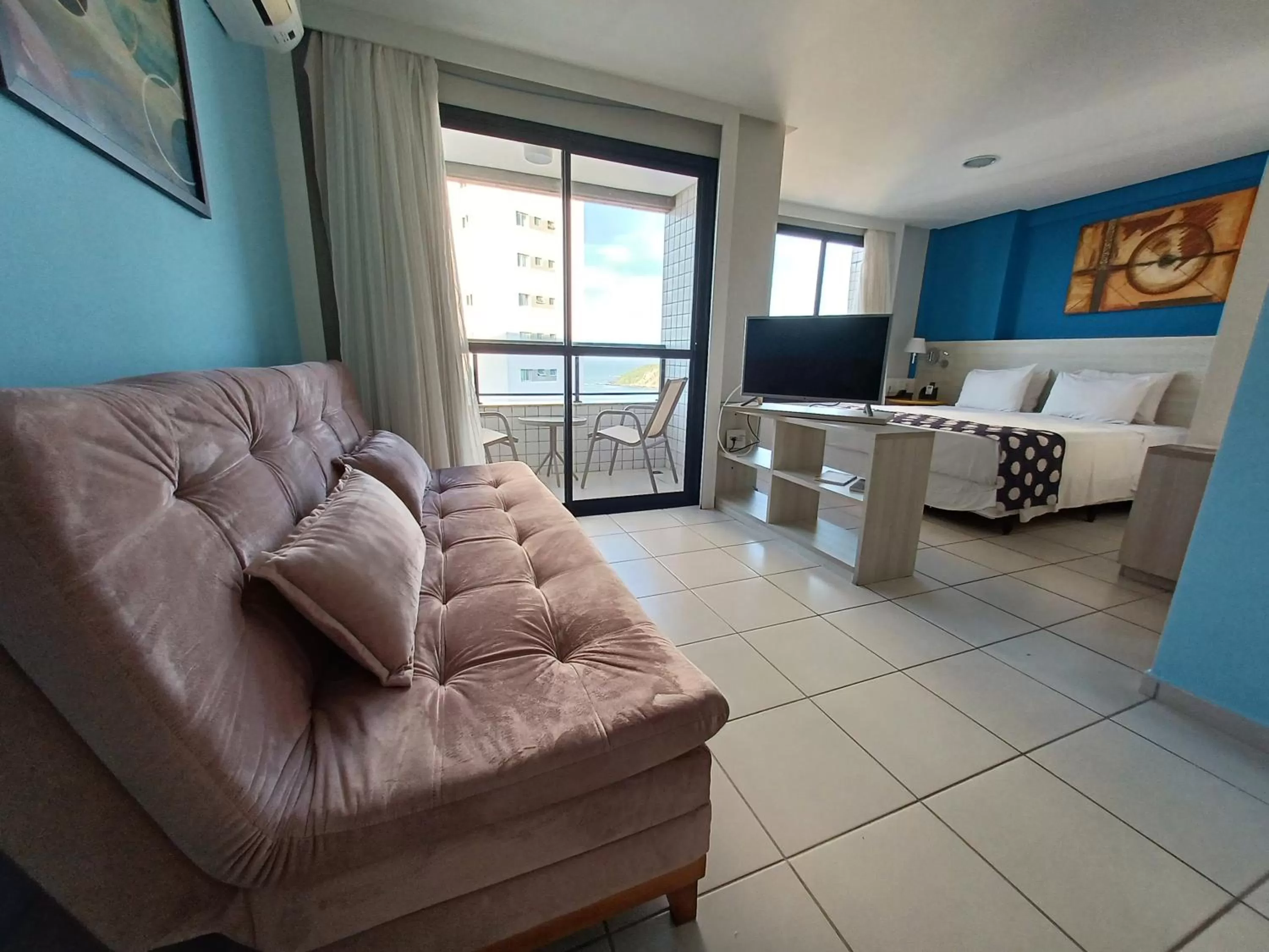 Communal lounge/ TV room, Seating Area in Ponta Negra Flat Confort 18 Andar