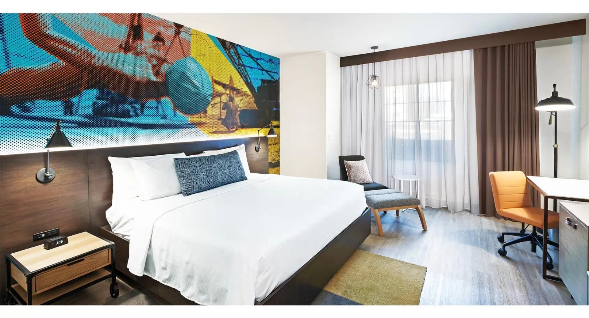 Bed in Hotel Indigo Tulsa DWTN/Entertainment Area