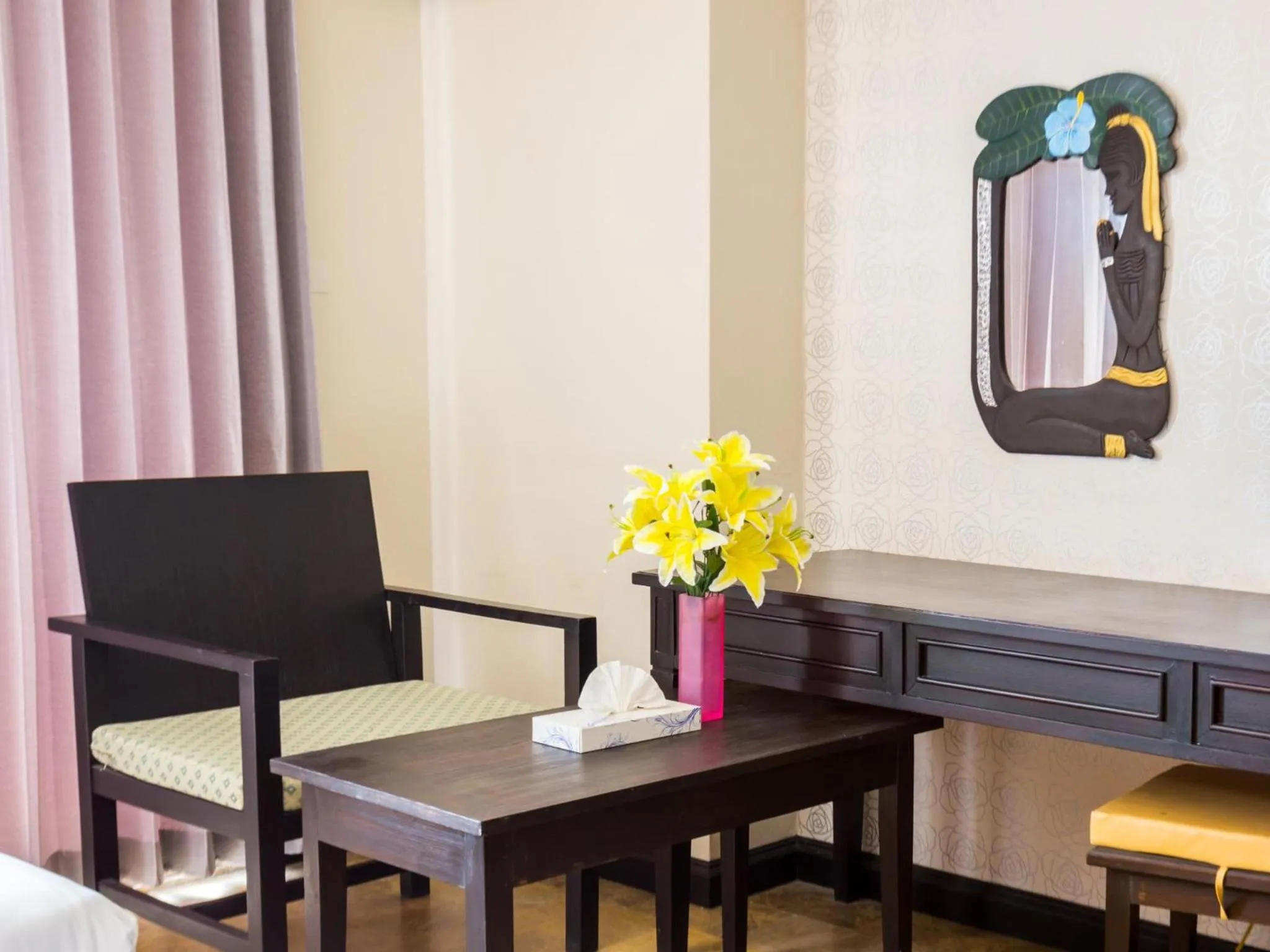 Communal lounge/ TV room in All Together Suite Hotel