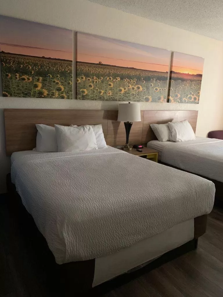 Bed in Days Inn by Wyndham Topeka