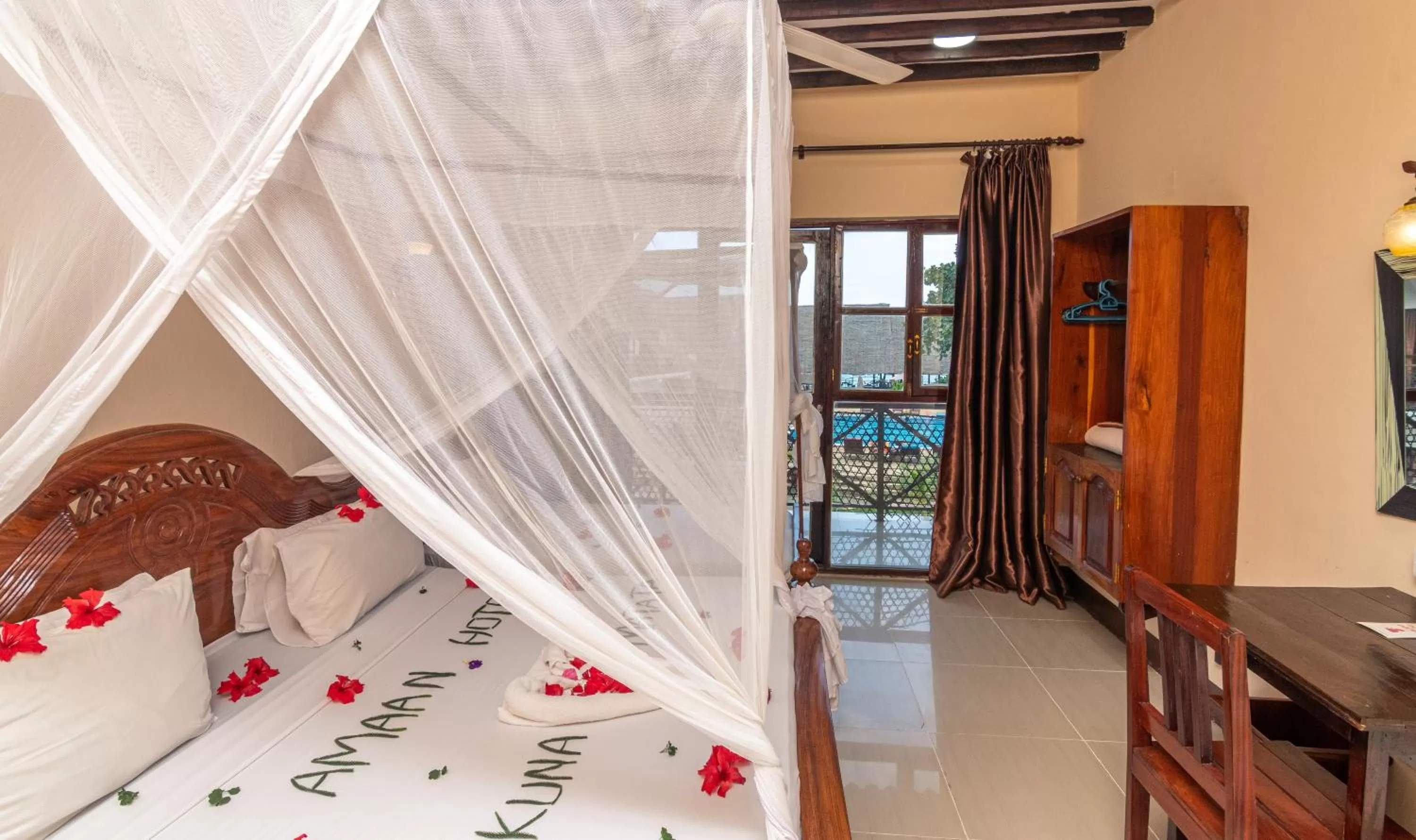 Bed in Amaan Beach Bungalows