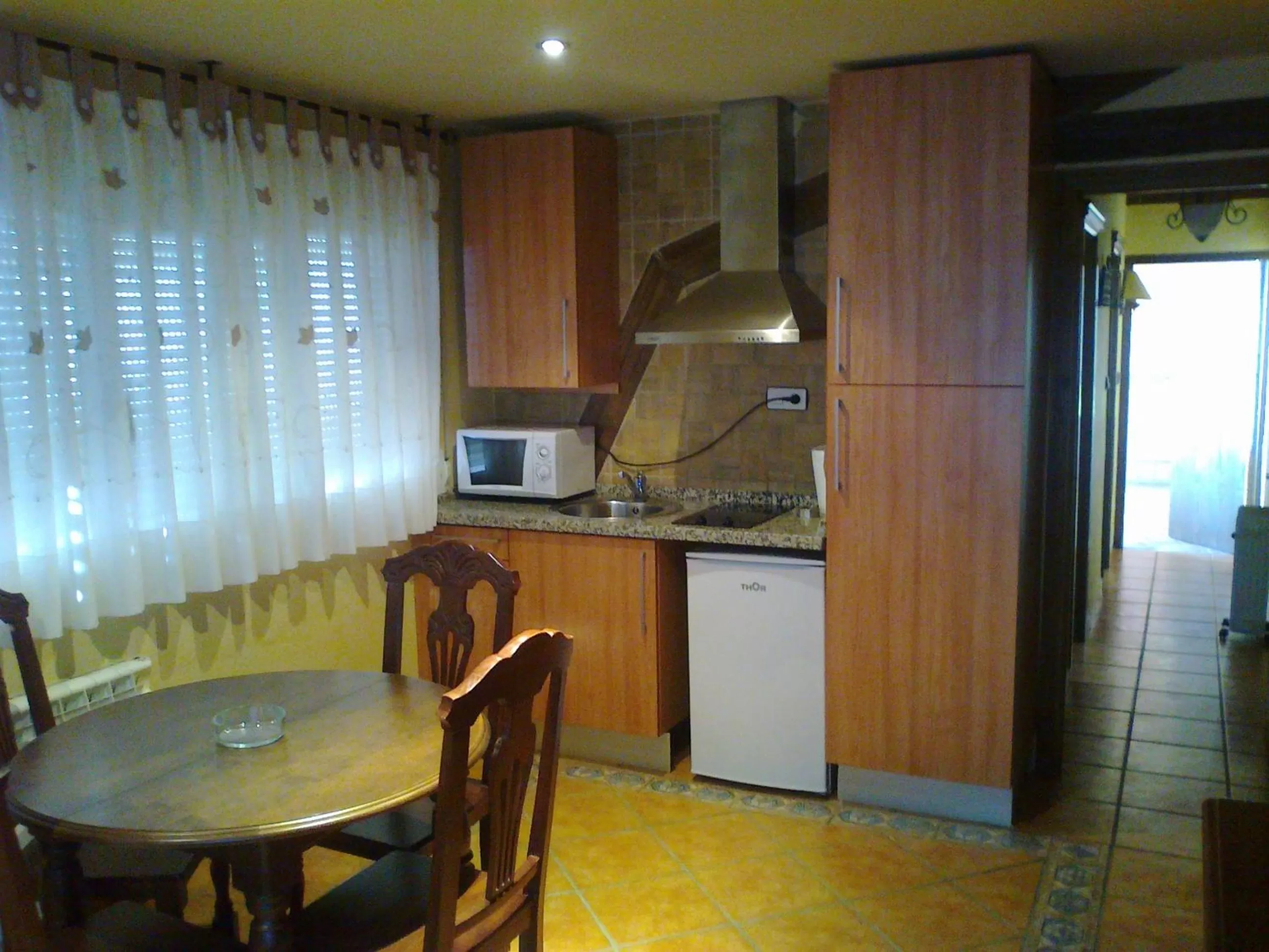 Kitchen or kitchenette in Apartamentos Sierra Nevada Welcome