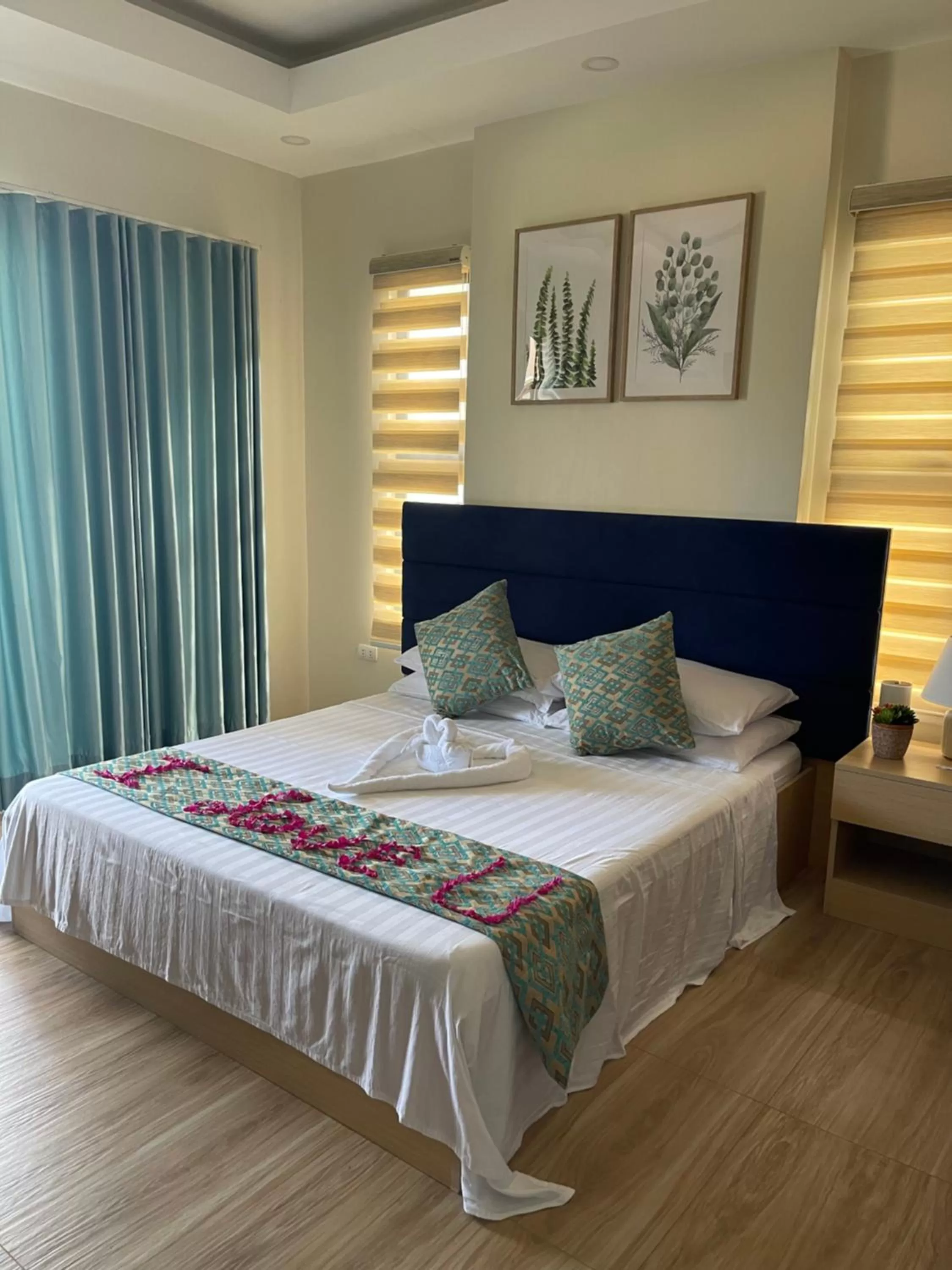 Bed in FIG Sunset View Resort