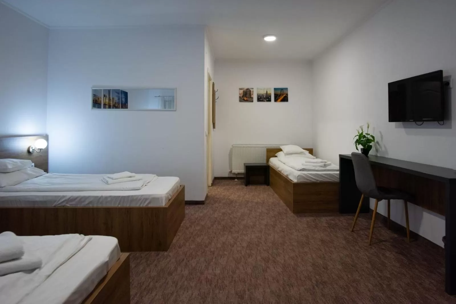 Bed in Carnival City Hotel Oradea