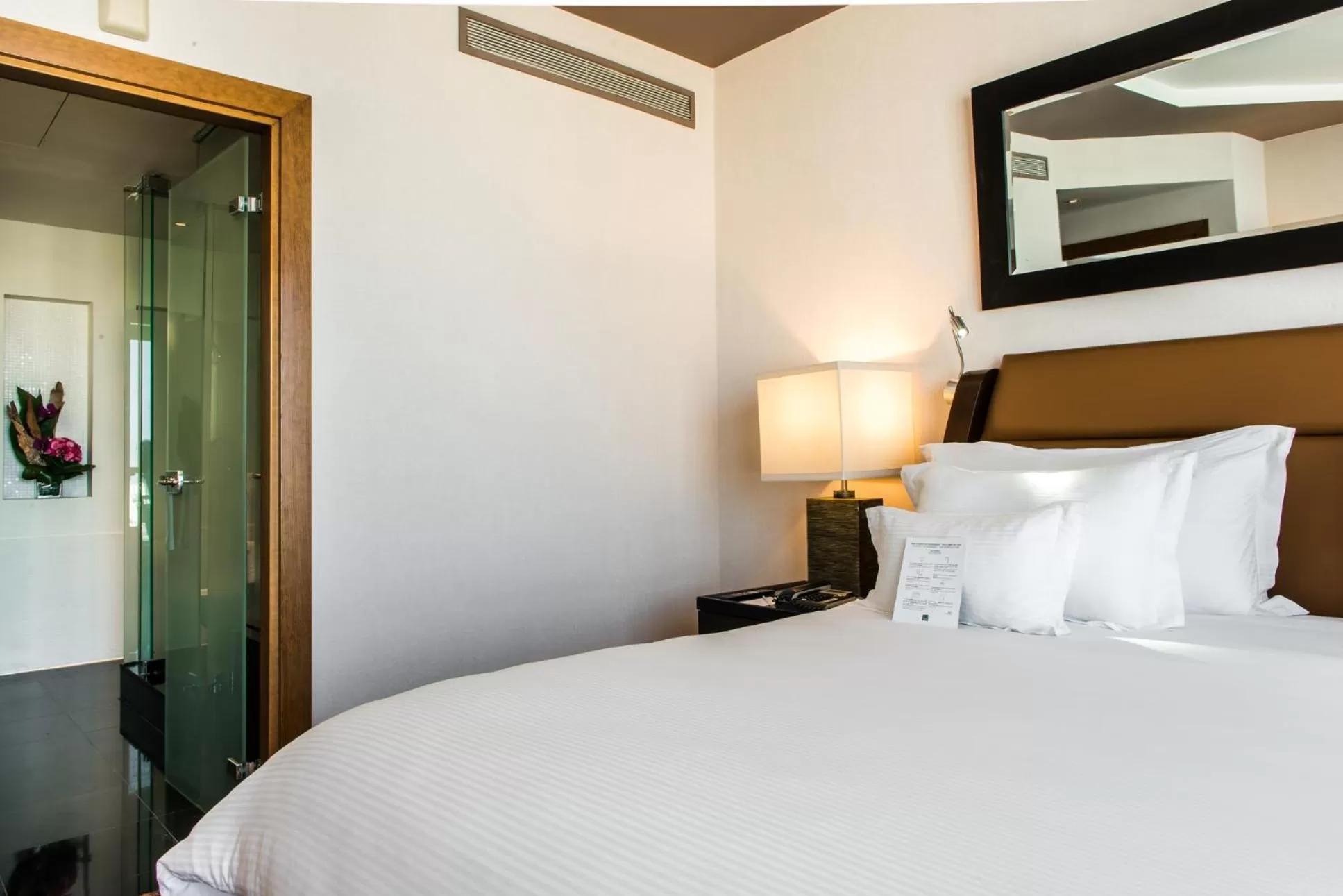 Bed in Kenzi Tower Hotel