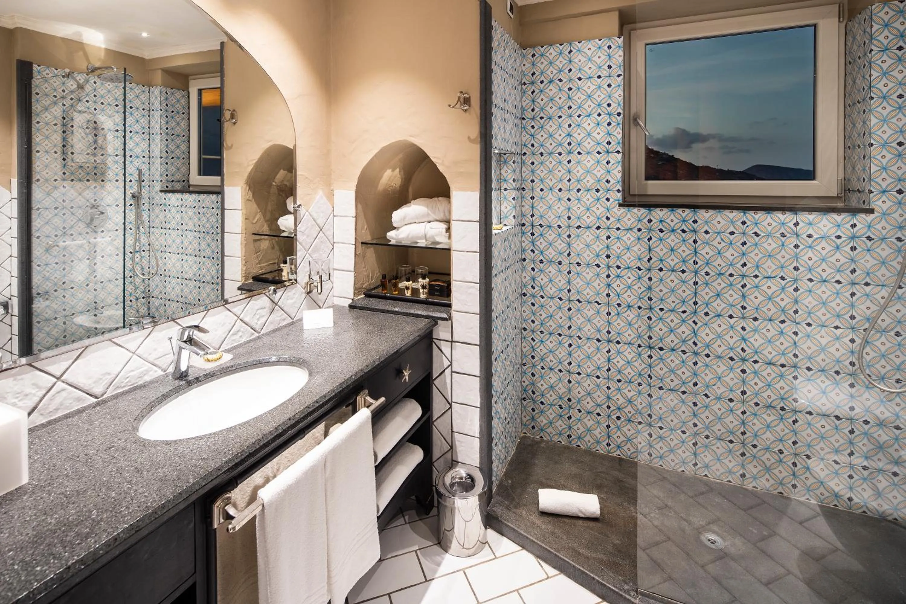 Bathroom in Therasia Resort Sea and SPA - The Leading Hotels of the World