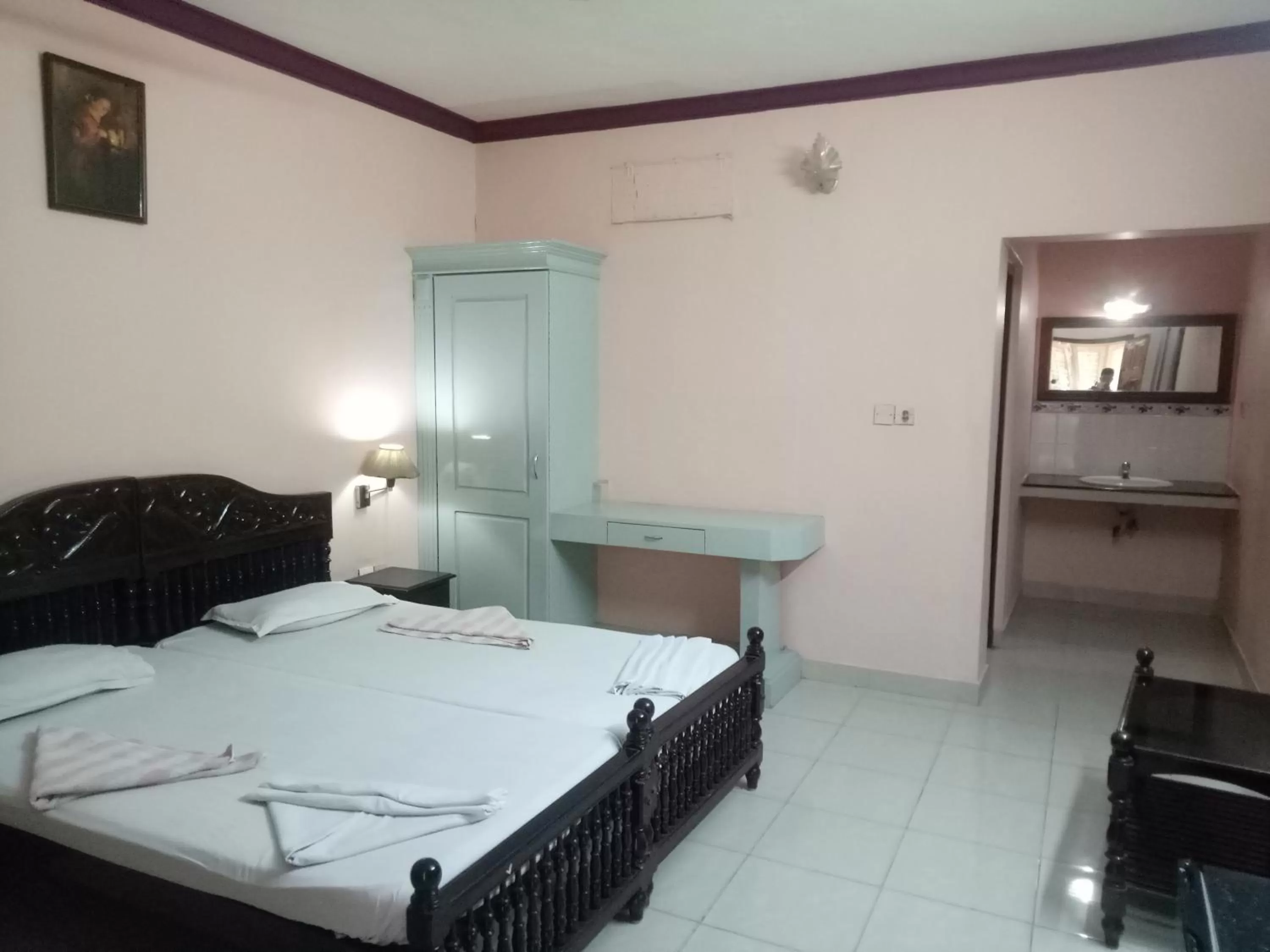 Bed in Wilson Ayurvedic Beach Resorts