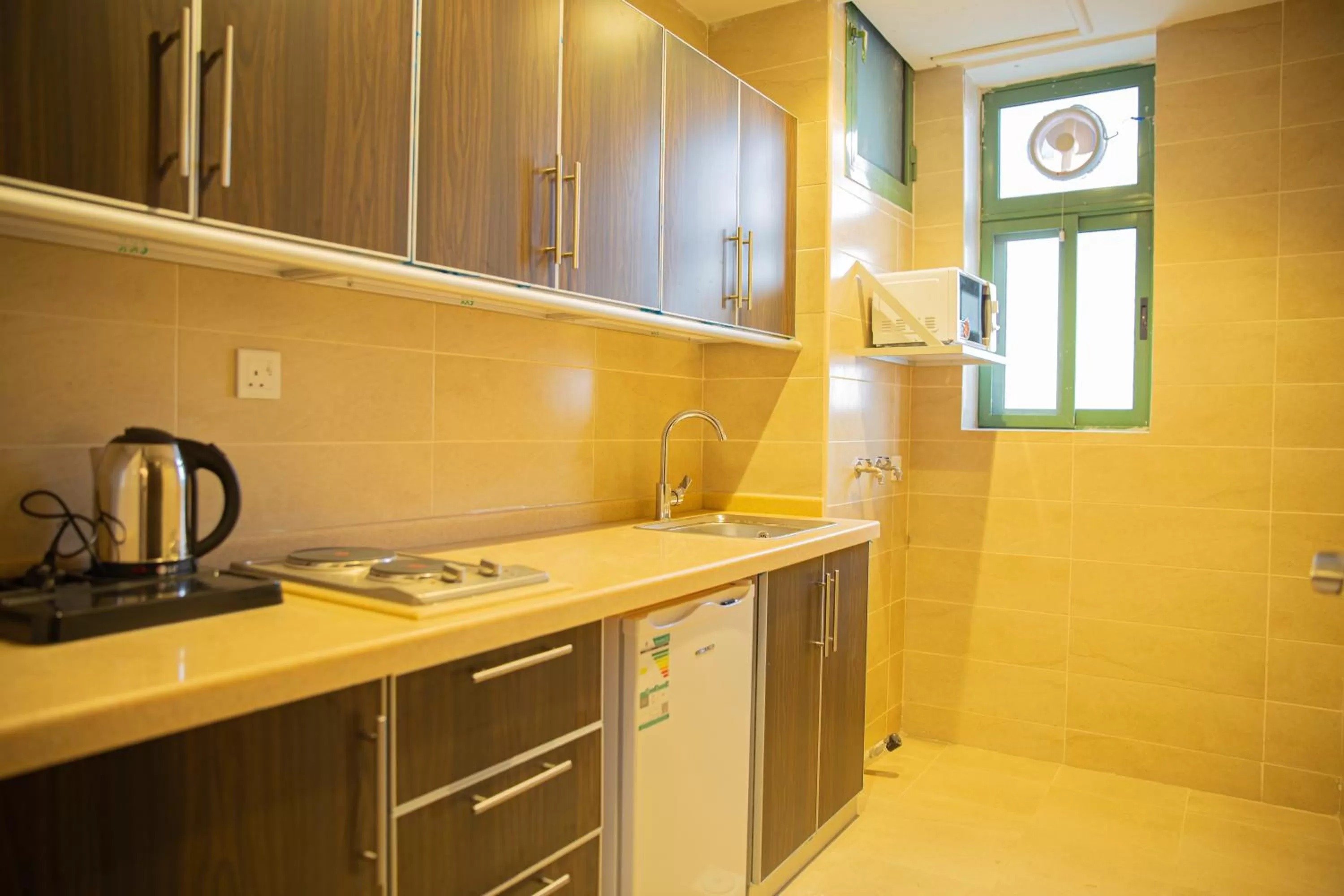 Kitchen or kitchenette in Mabet Al Tahlia Serviced Apartments