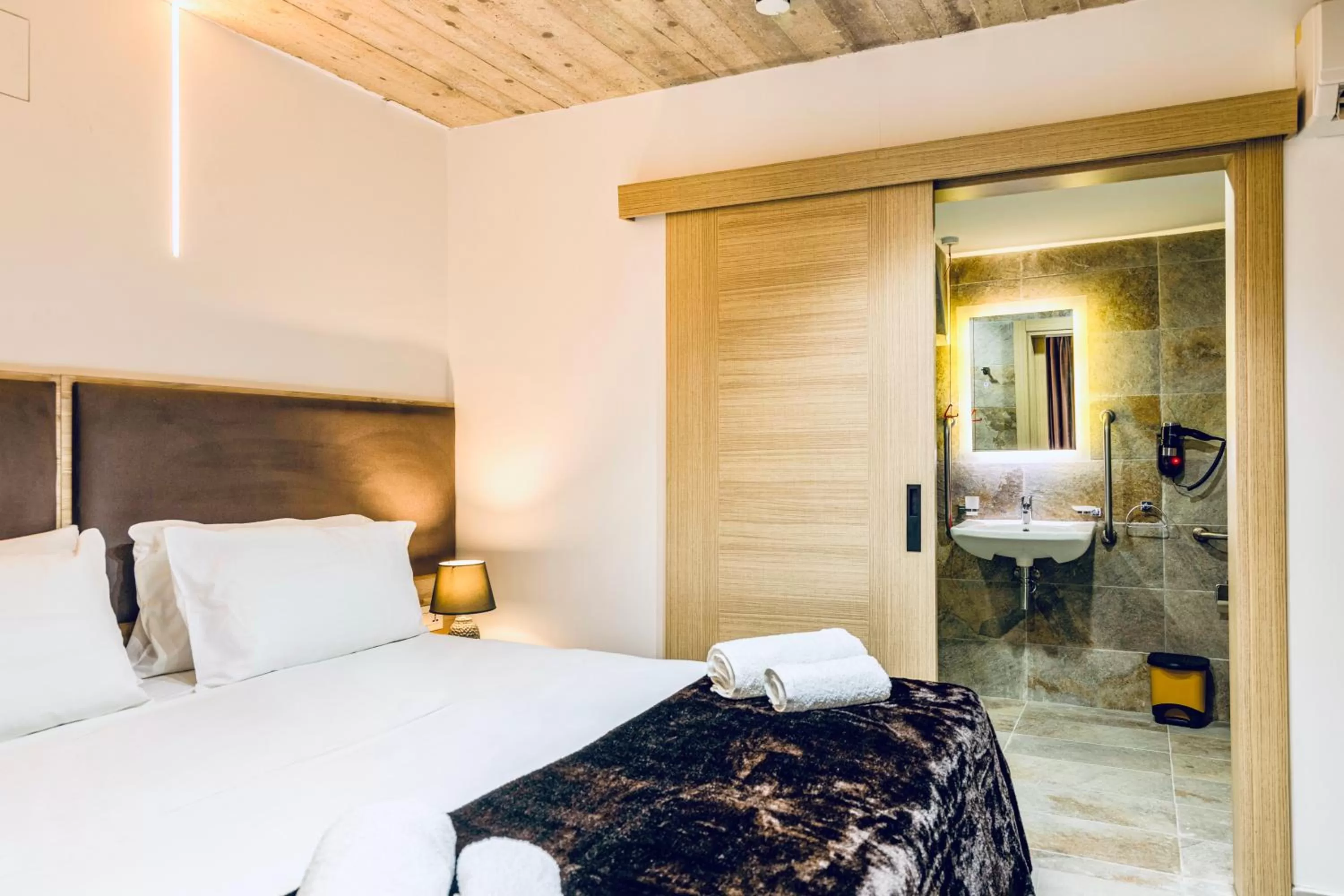 Bed in The Mike Hotel by CX Collection