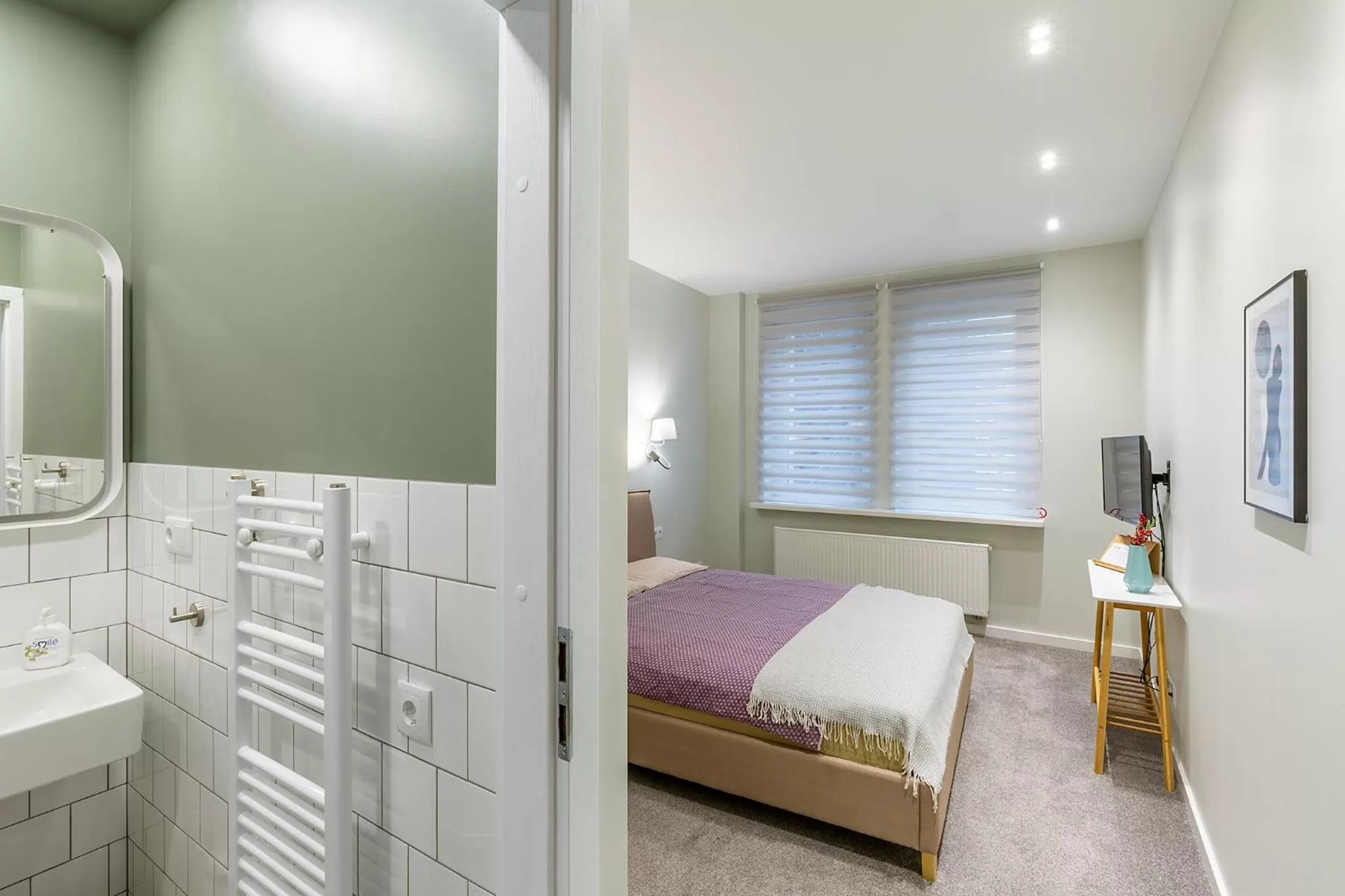 Bed in Art & Comfort Rooms