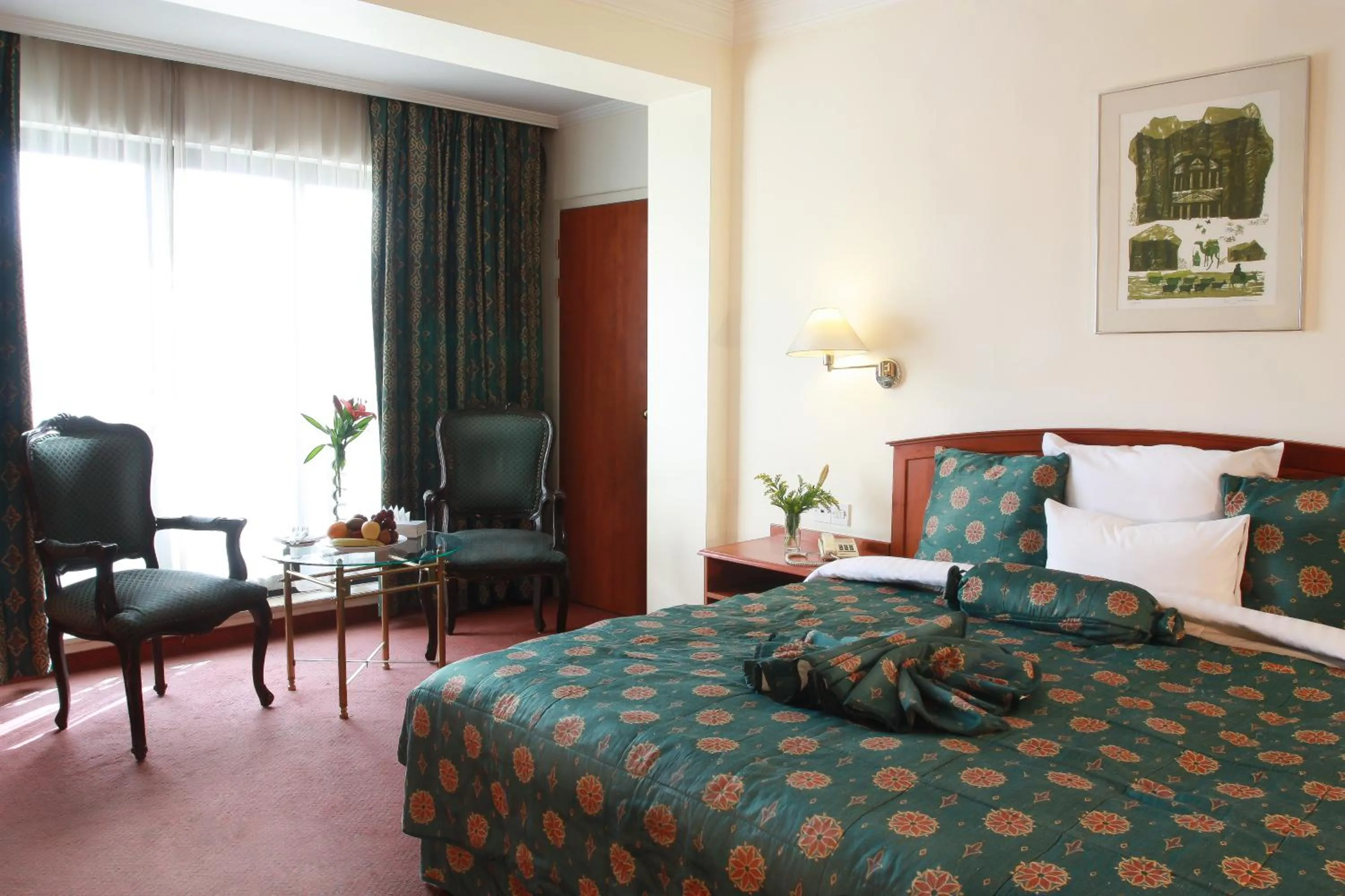 Bed in Grand Palace Hotel