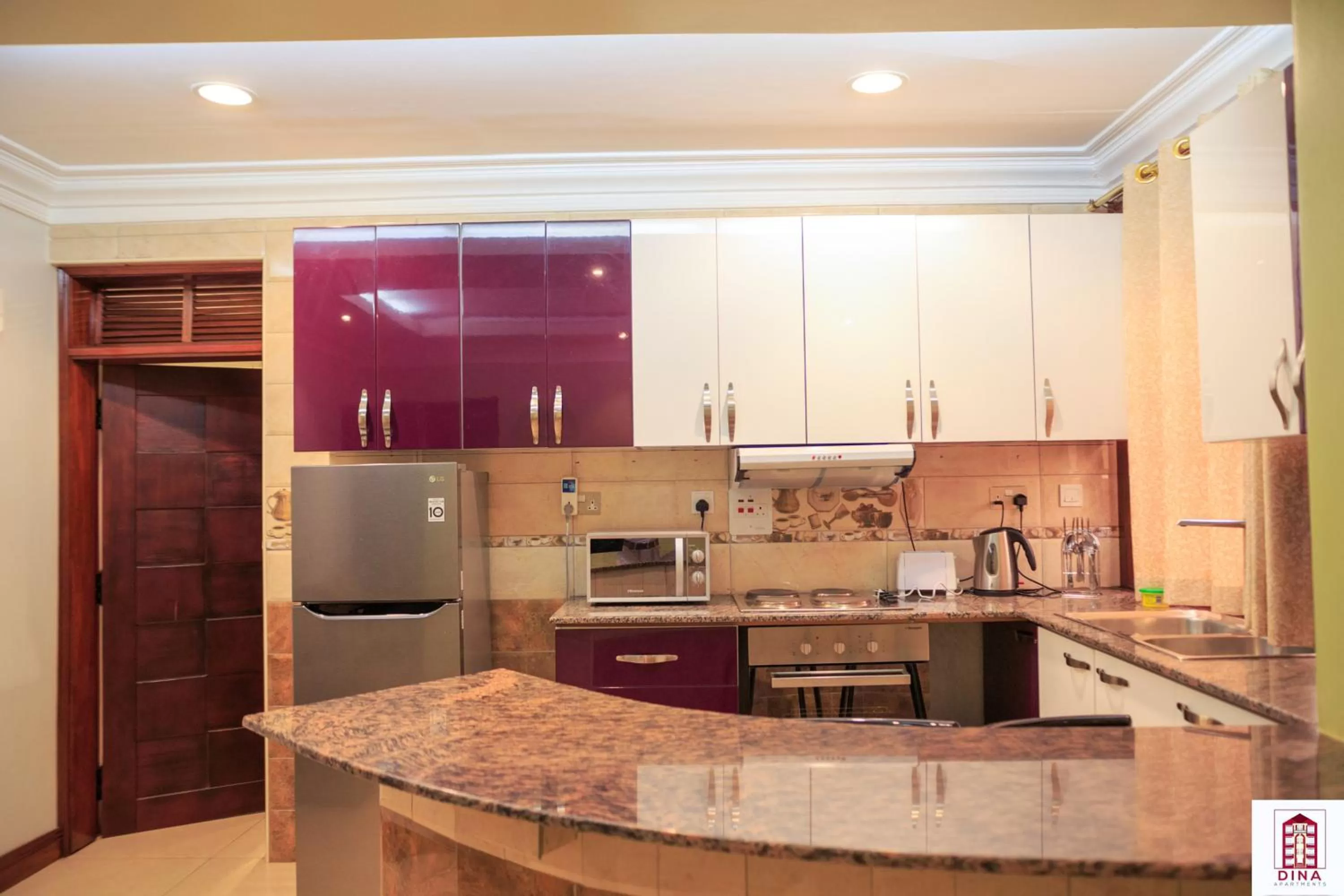 Kitchen or kitchenette in Dina Apartments