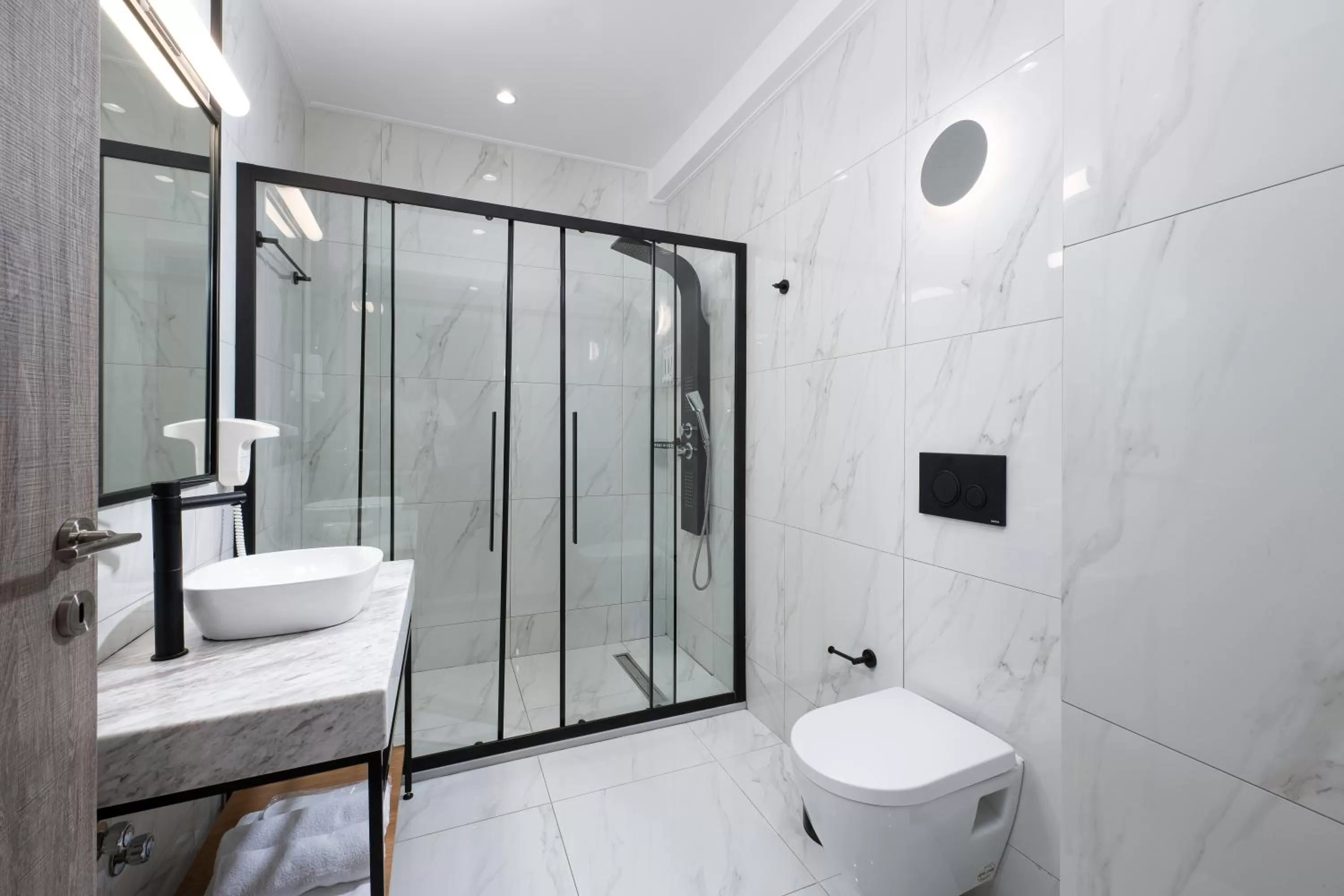 Shower in Enattica Suites