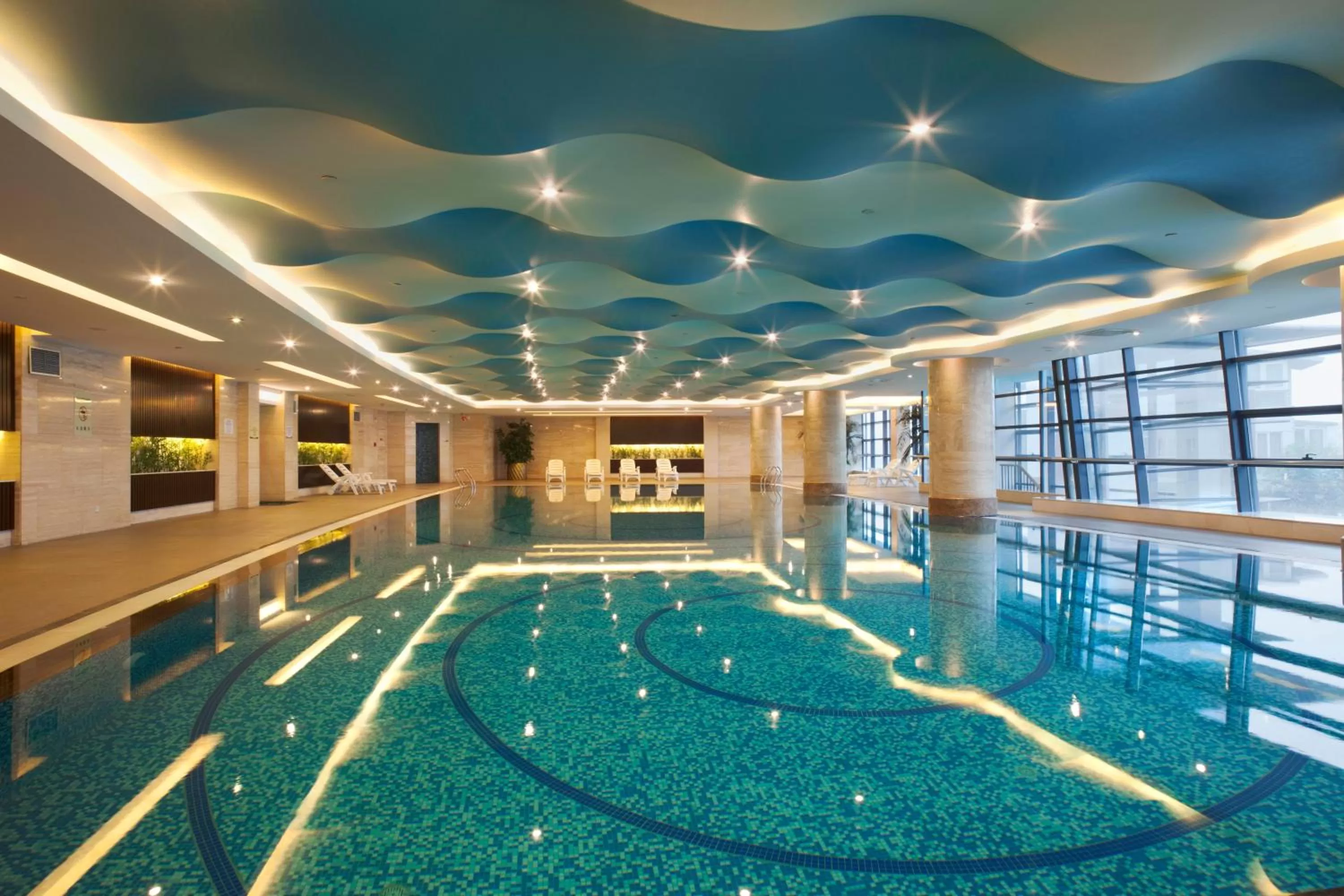 Swimming pool in Crowne Plaza Beijing International Airport by IHG