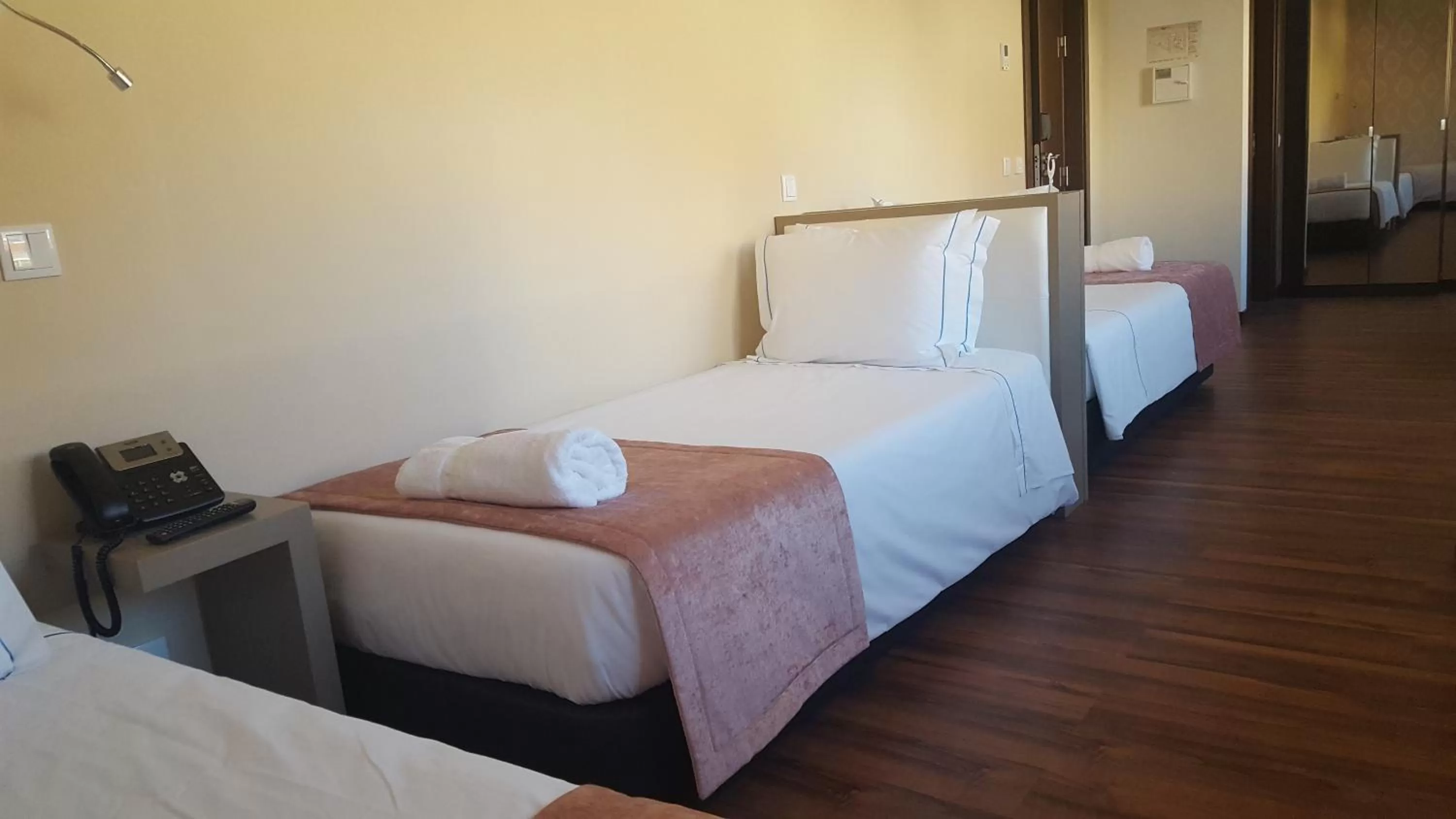 Bed in Fenicius Charme Hotel