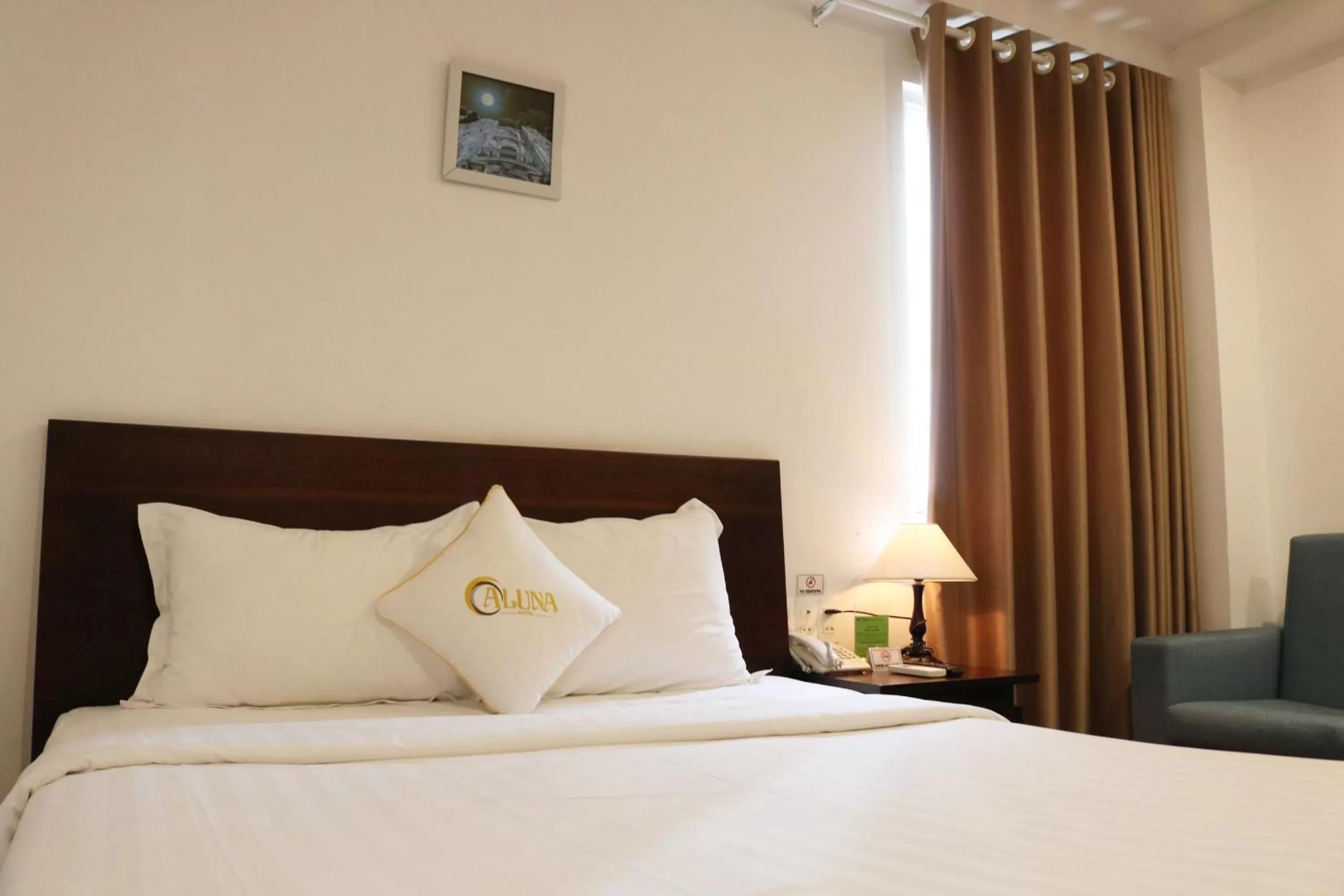 Bed in ALUNA Ben Thanh Hotel