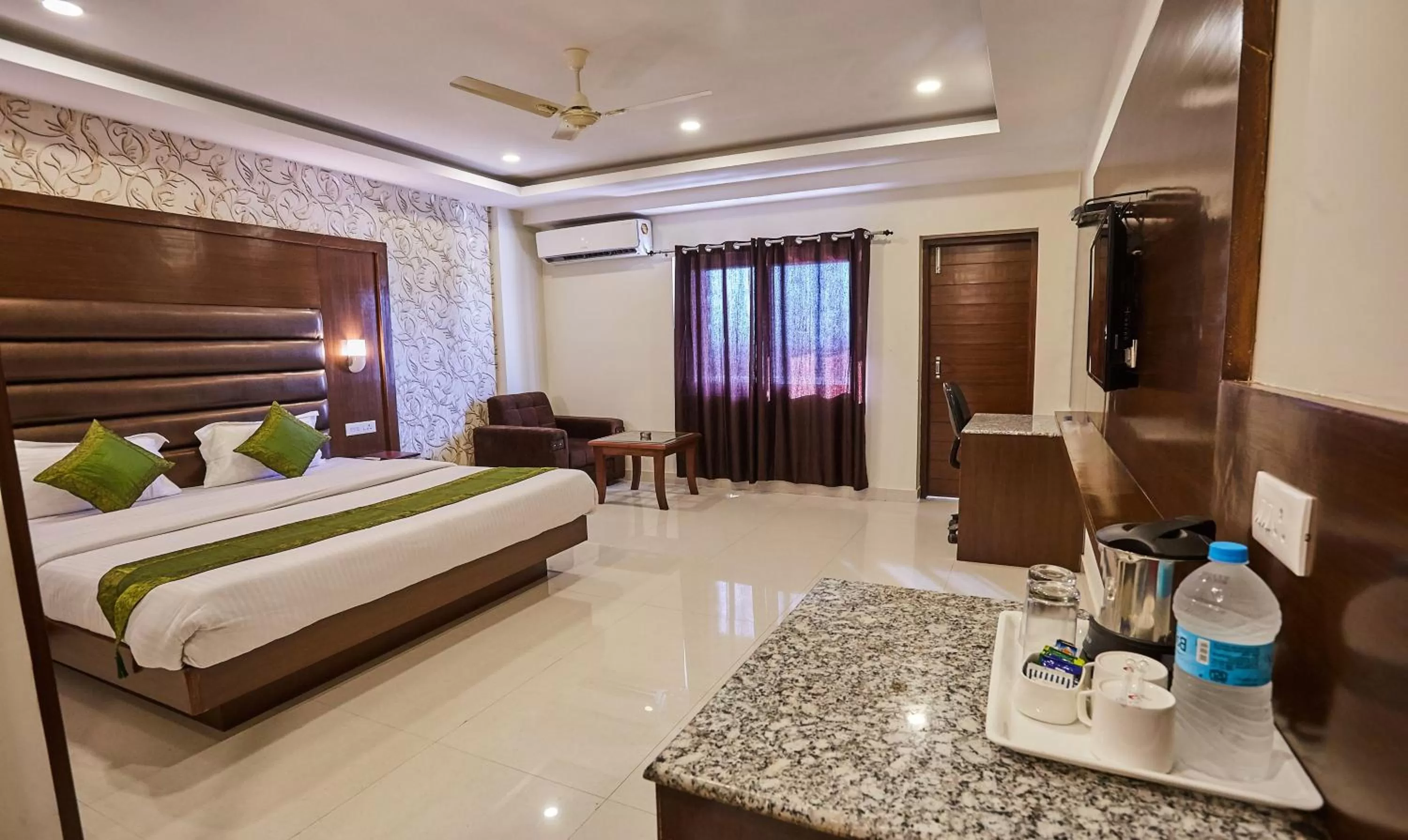 TV and multimedia, Bed in Treebo Grand Legacy Elite With Roof Top Cafe