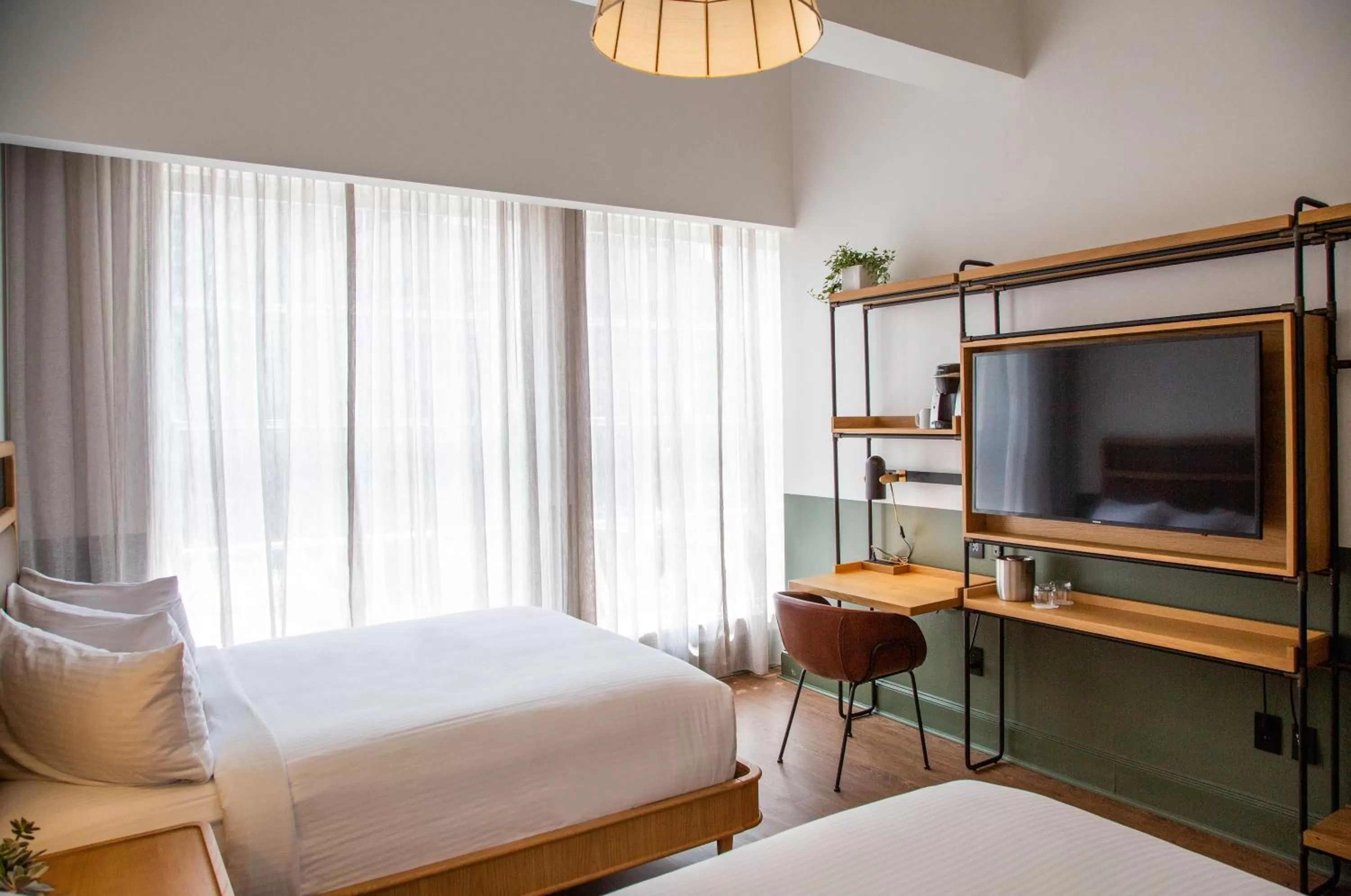 Bed in Hotel Theo New Orleans, Tapestry Collection by Hilton