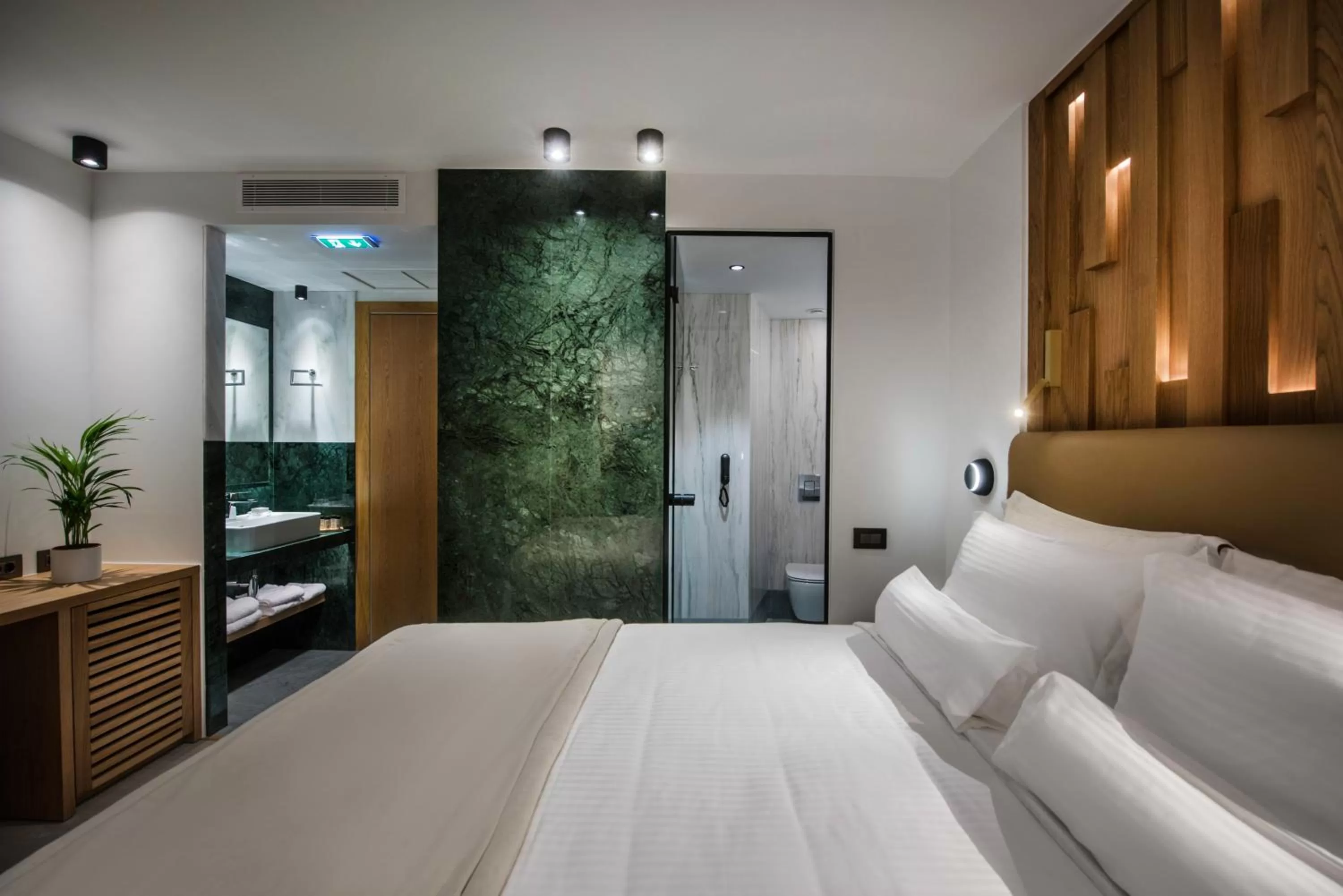 Bed in Dimargio Luxury Hotel & Spa