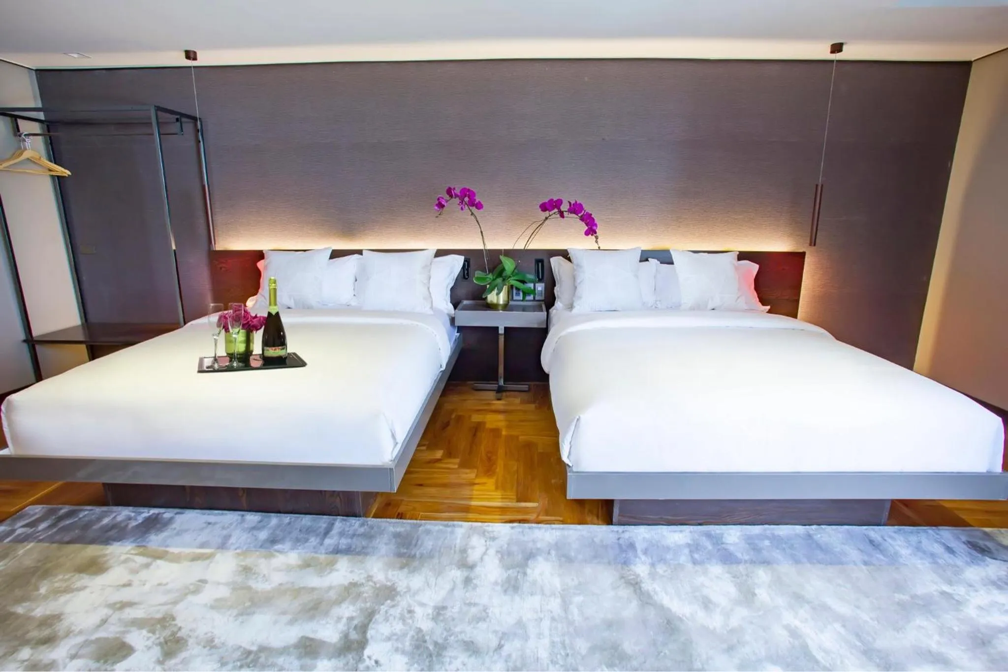 Bed in Ramada Encore by Wyndham Makati