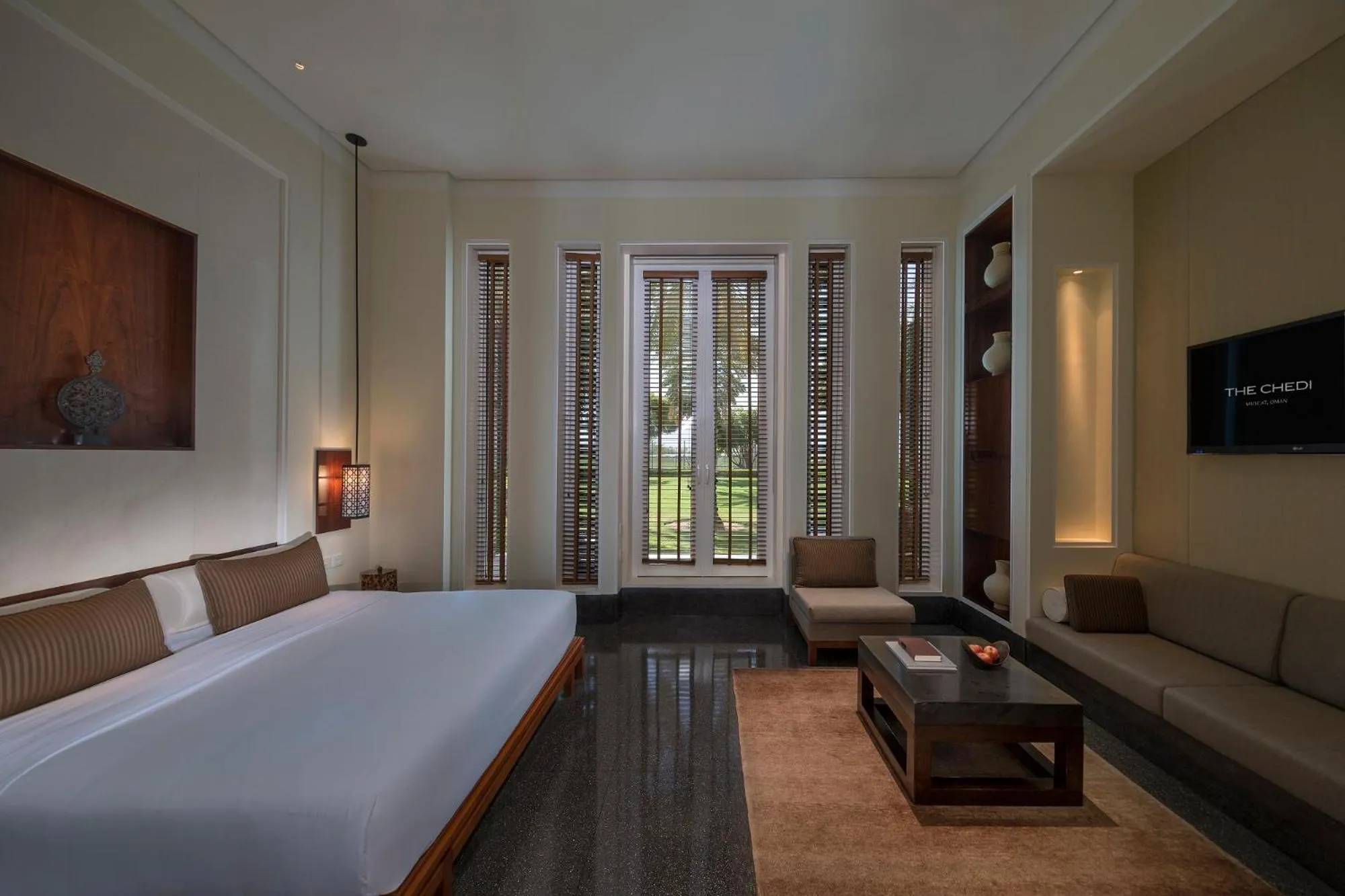 Photo of the whole room, Bed in The Chedi Muscat