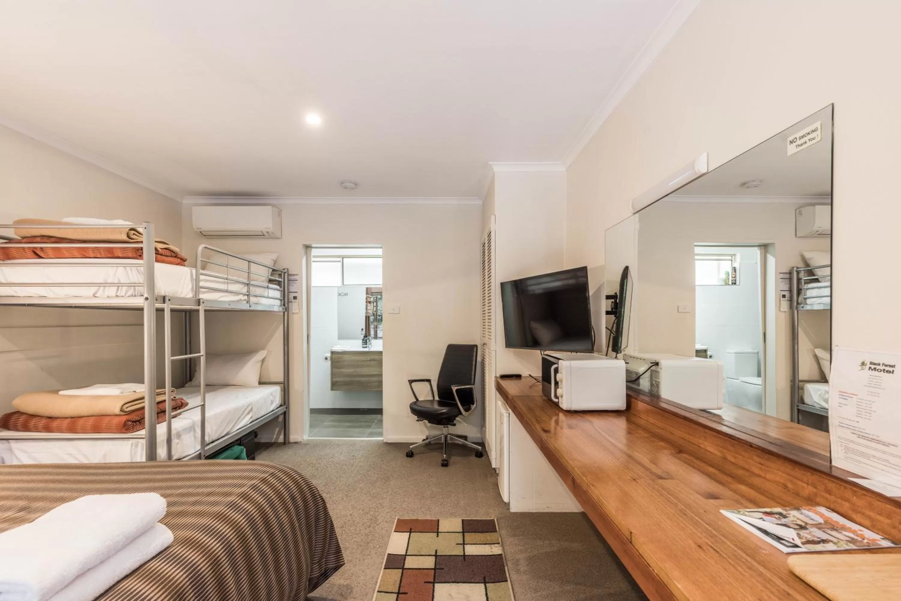 Bed in Black Forest Motel