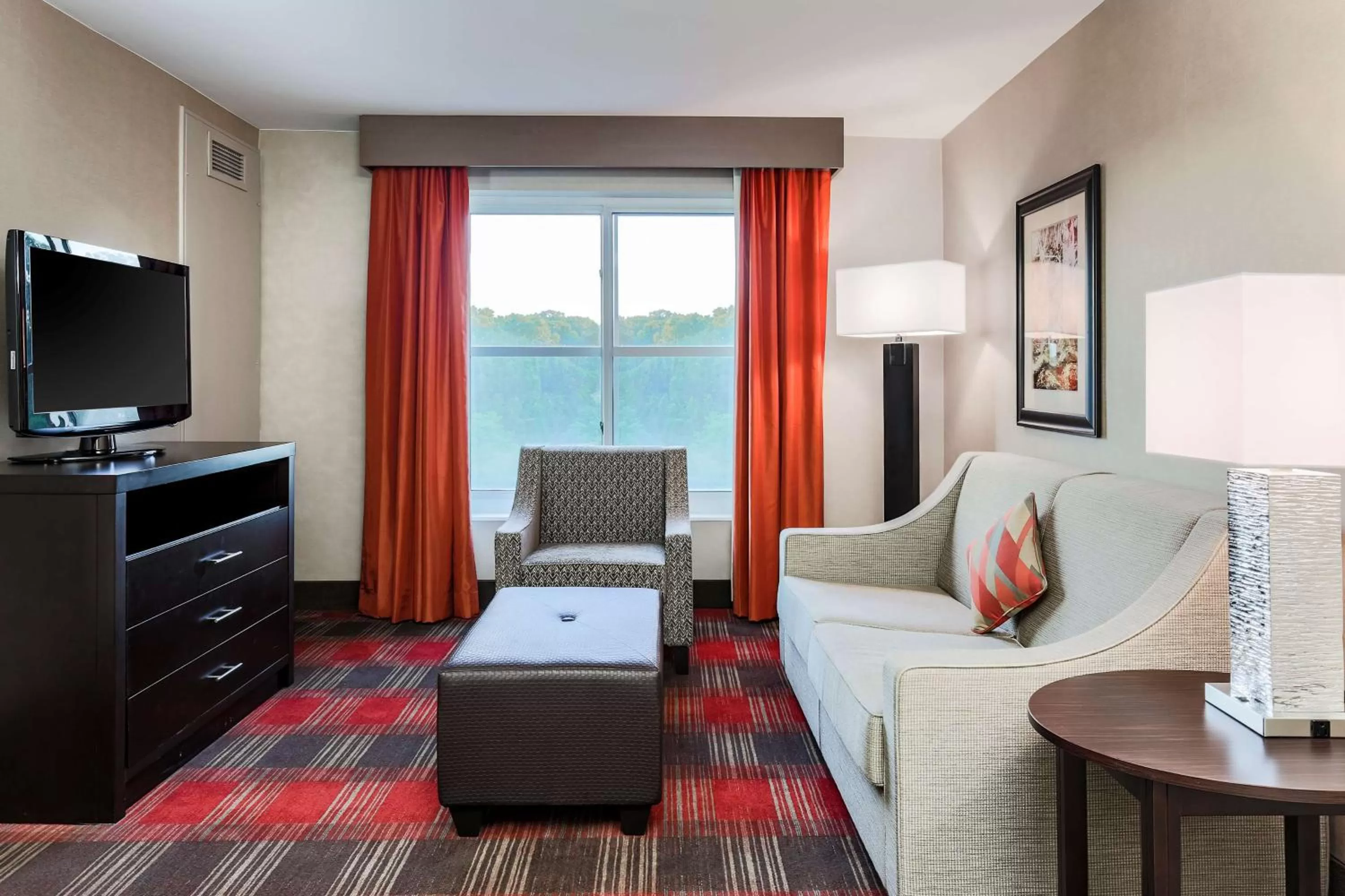 Living room in Homewood Suites by Hilton Long Island-Melville