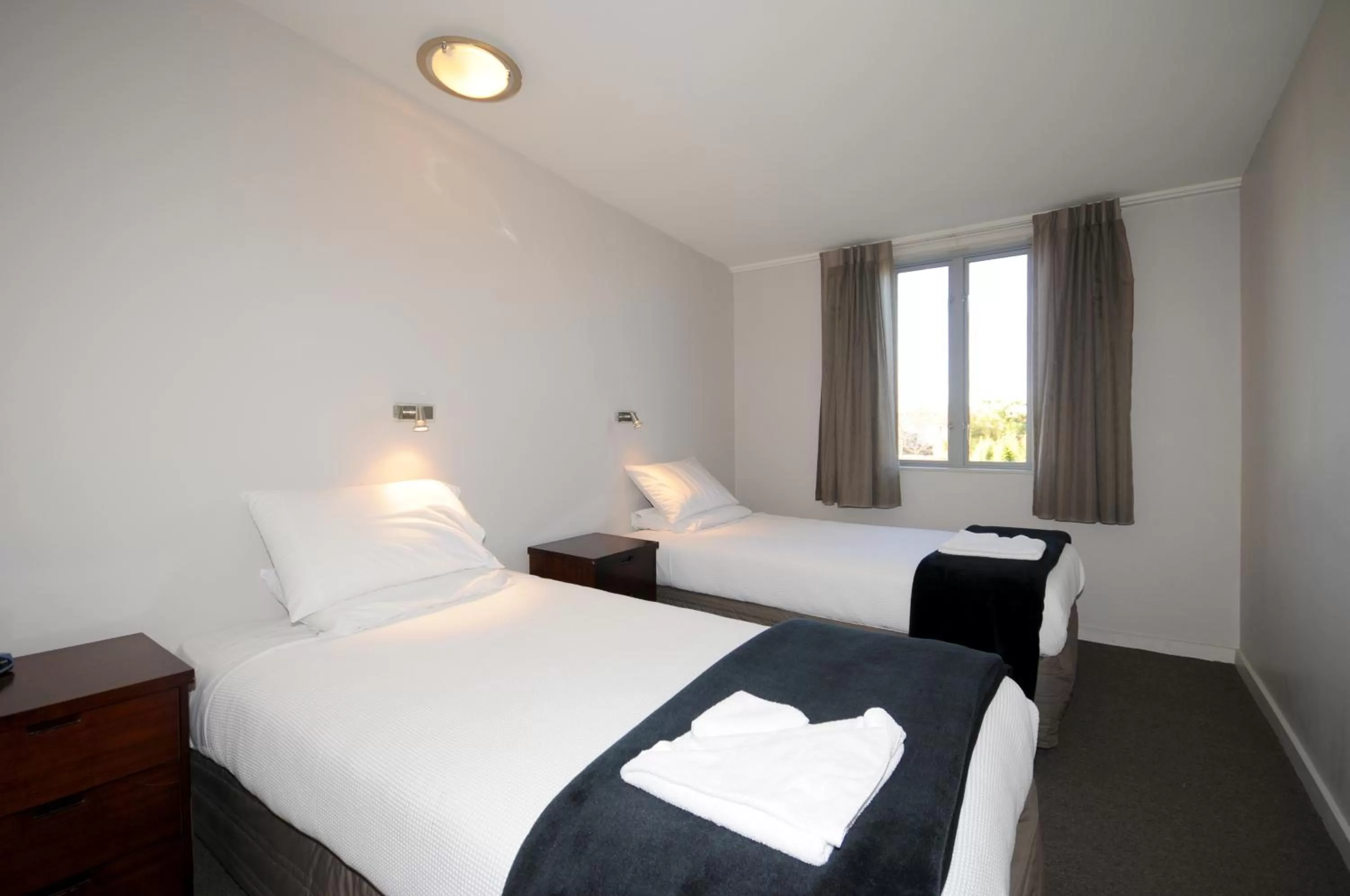 Bed in City Central Motel Apartments