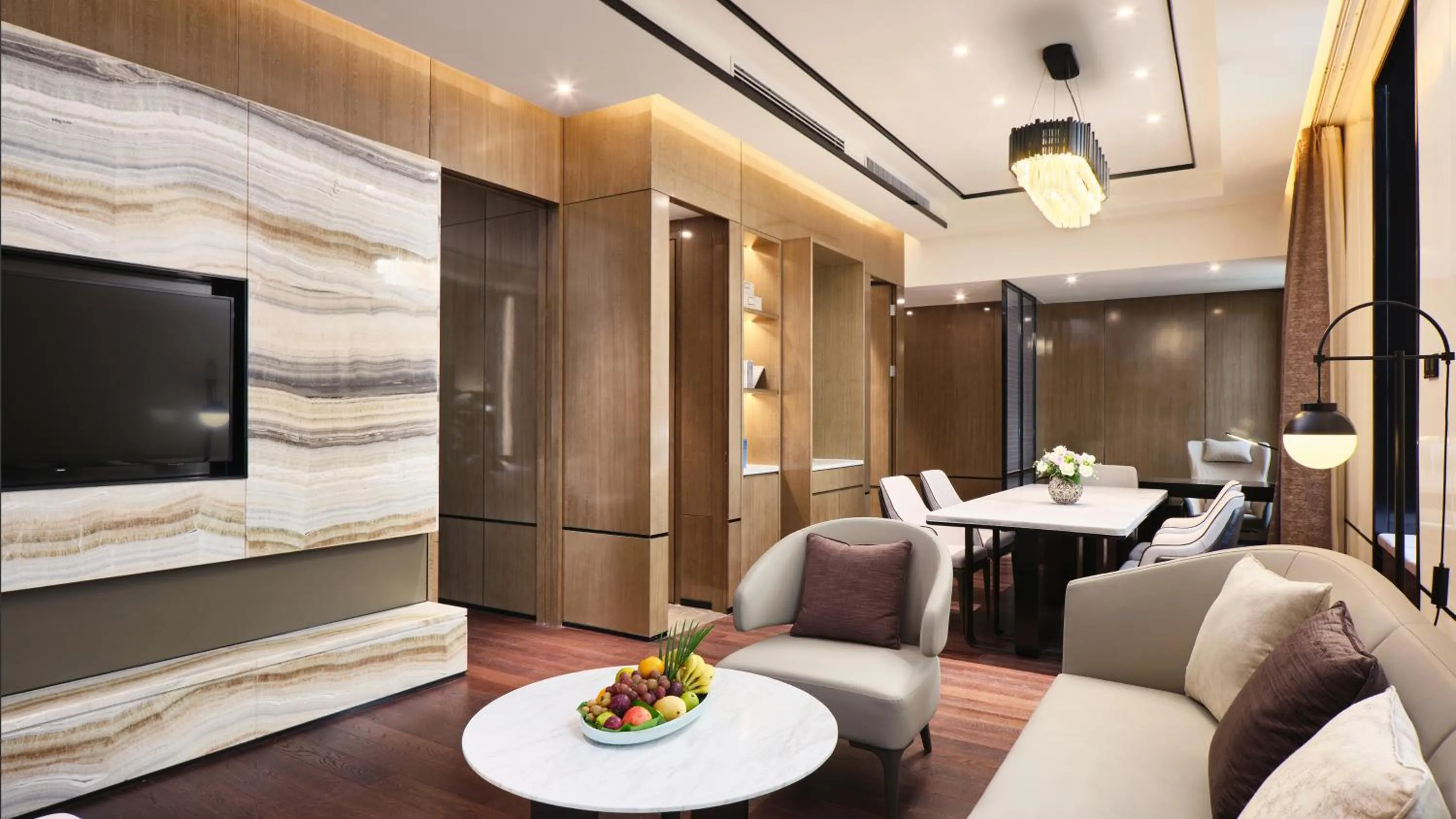 Living room in Crowne Plaza Wuhan Development Zone by IHG