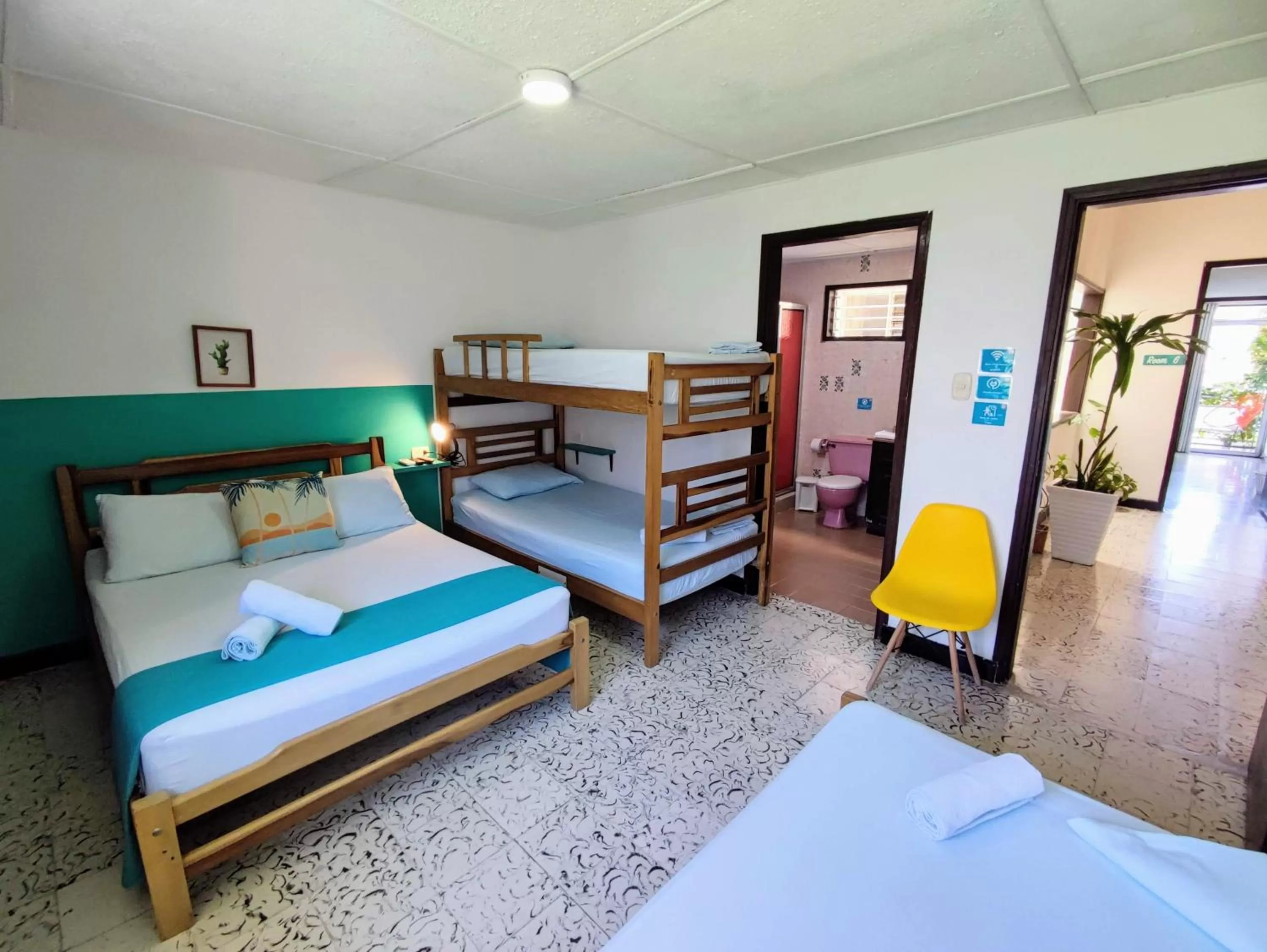 Bed in Bona Vida Hotel