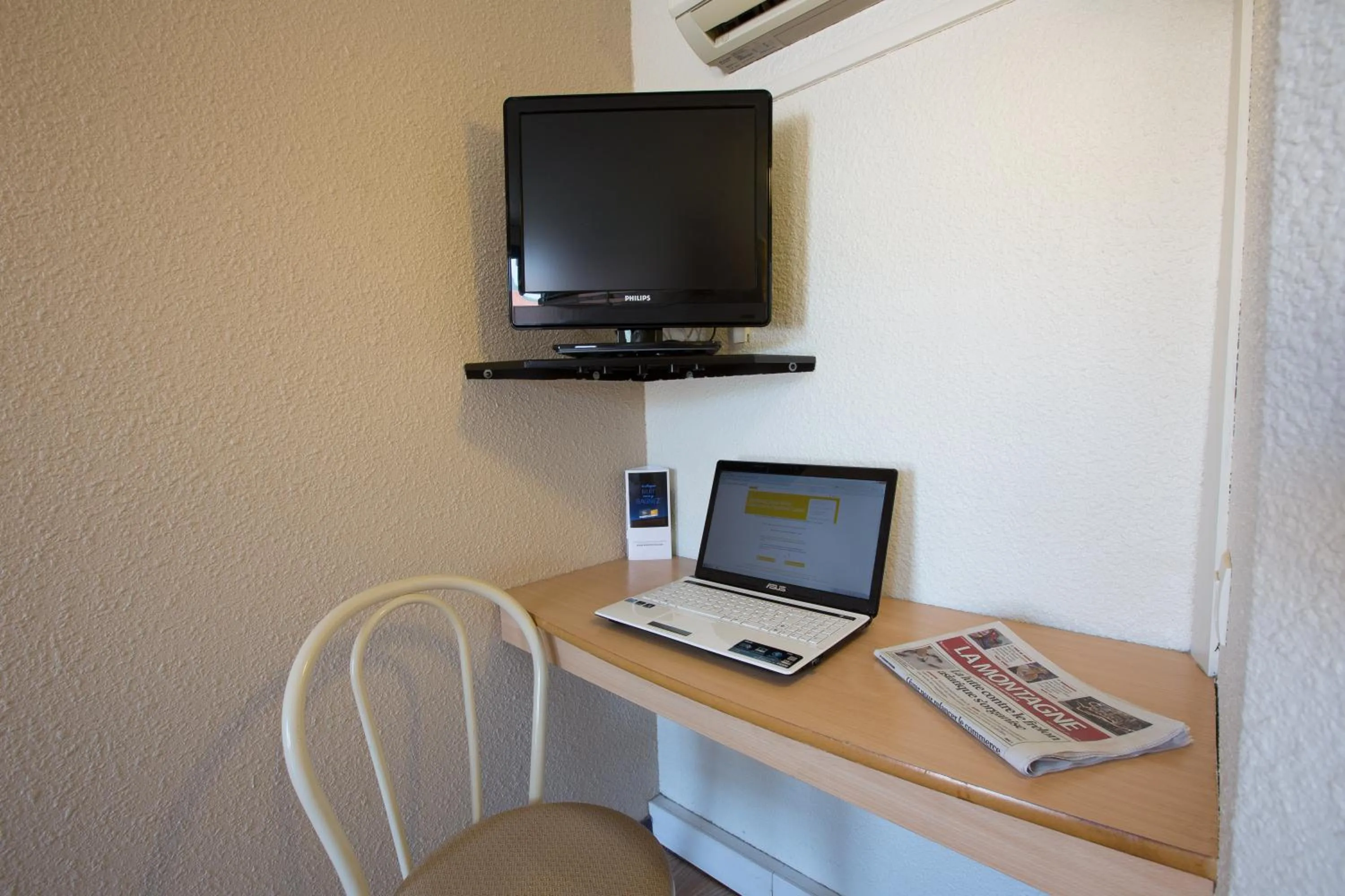 Seating area in Première Classe Clermont Ferrand Nord