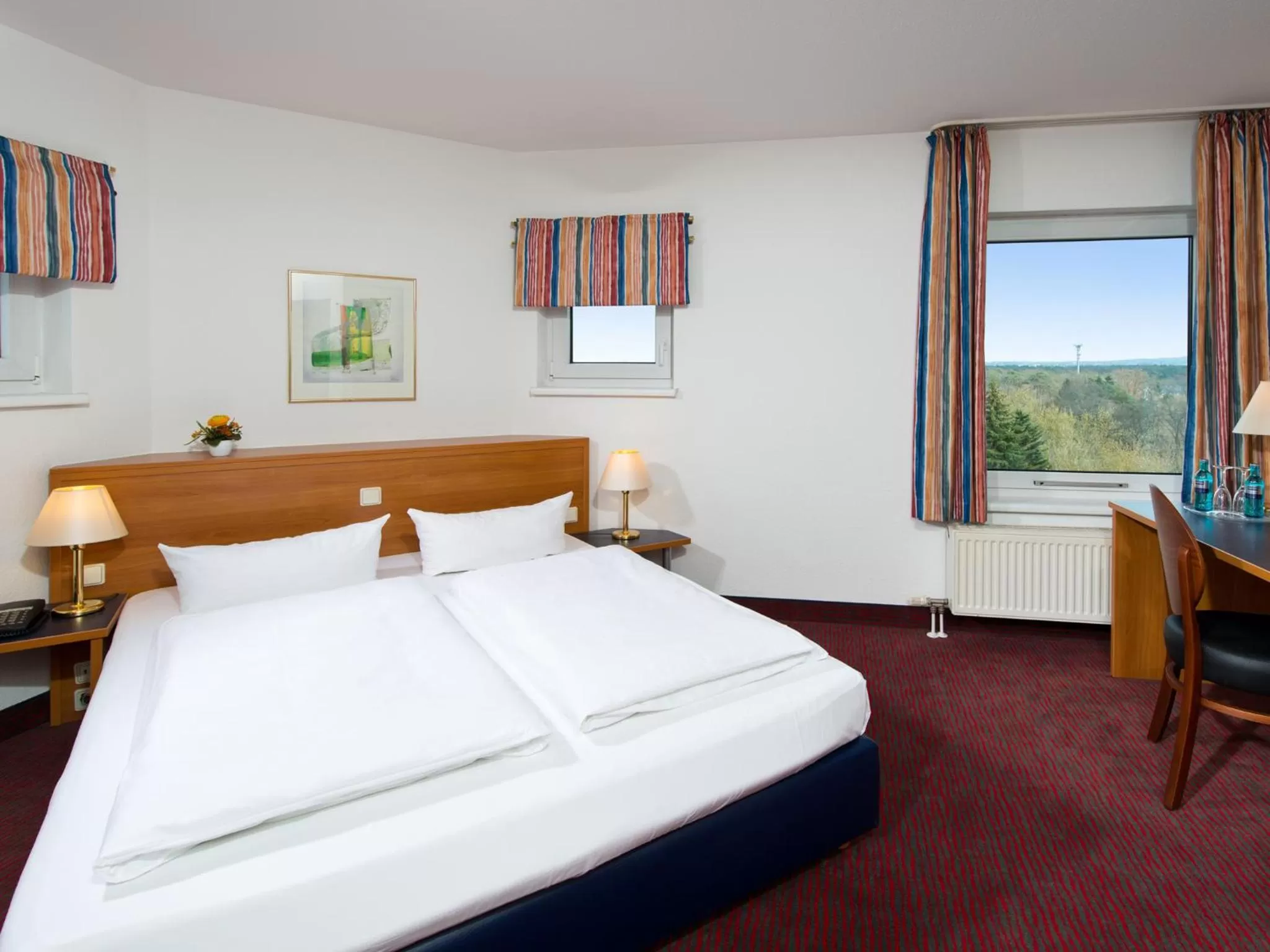 Bed in ACHAT Hotel Darmstadt Griesheim