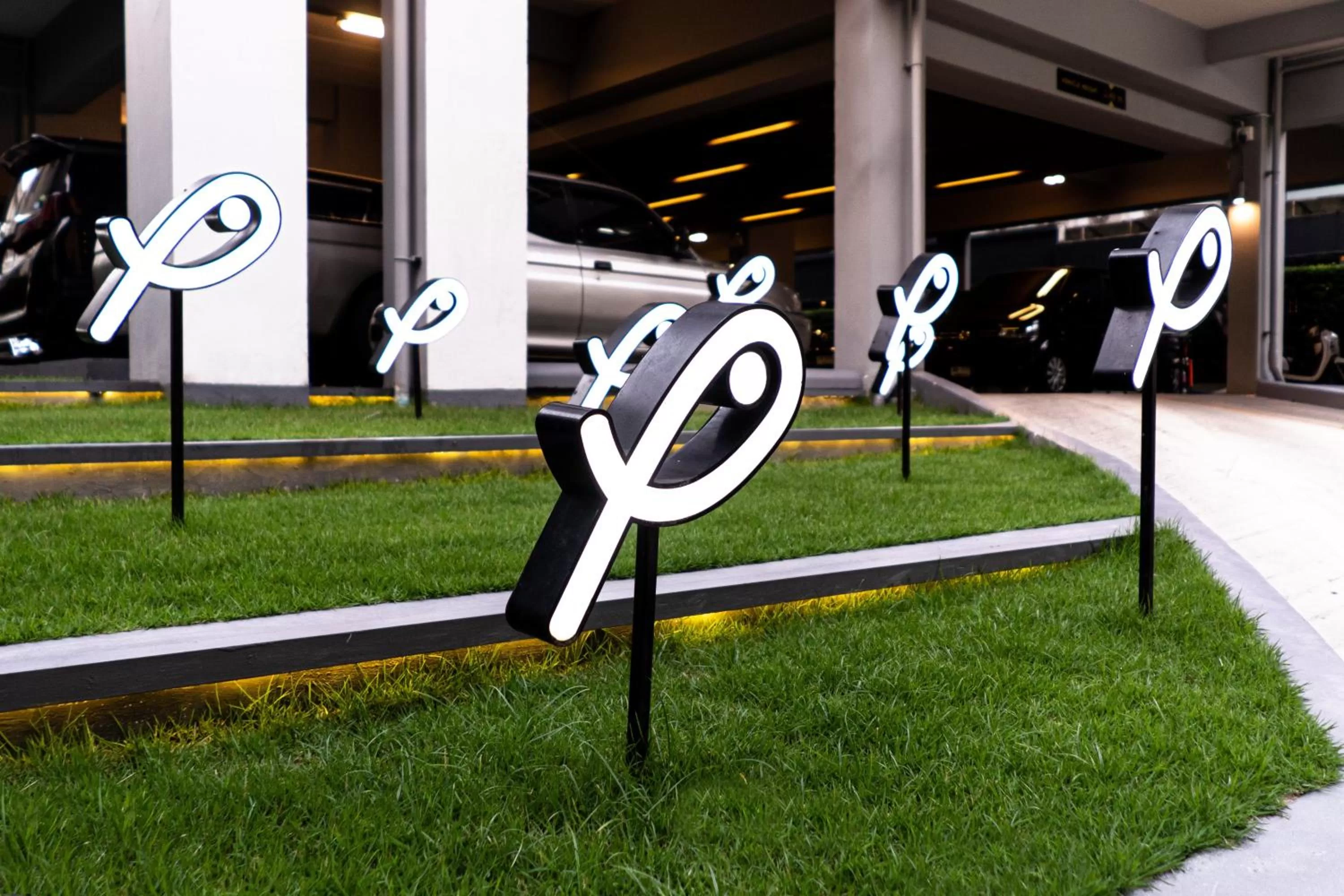 Property logo or sign in Ploen Place Residence