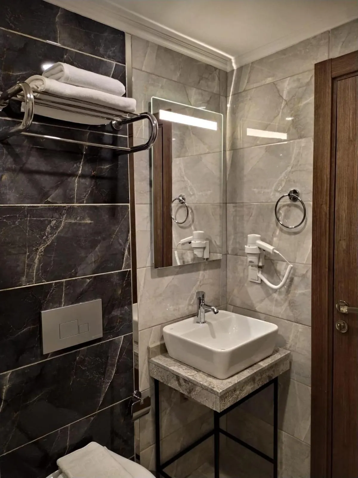 Bathroom in NUPERA HOTEL