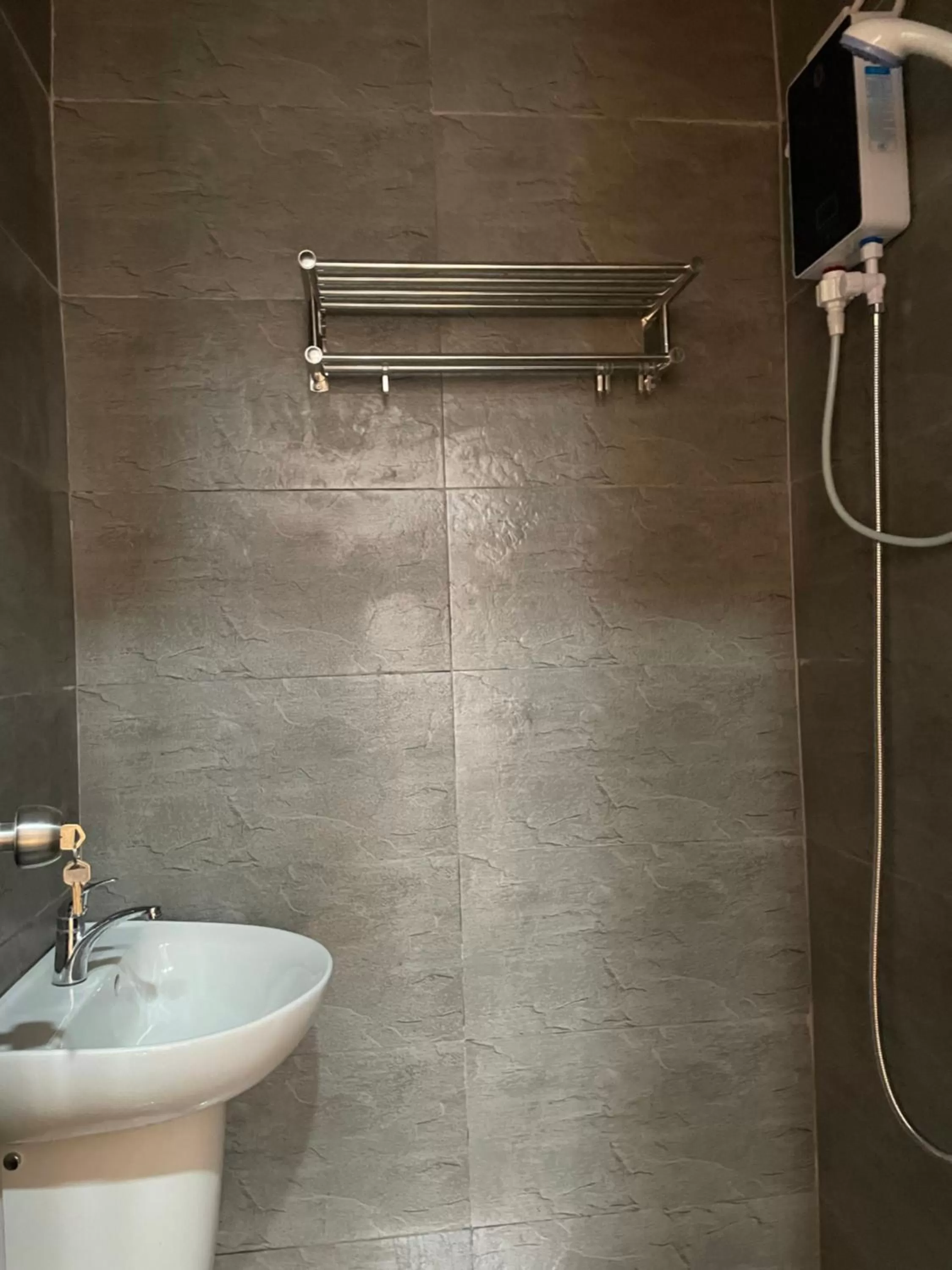 Shower in Rangya Hotel