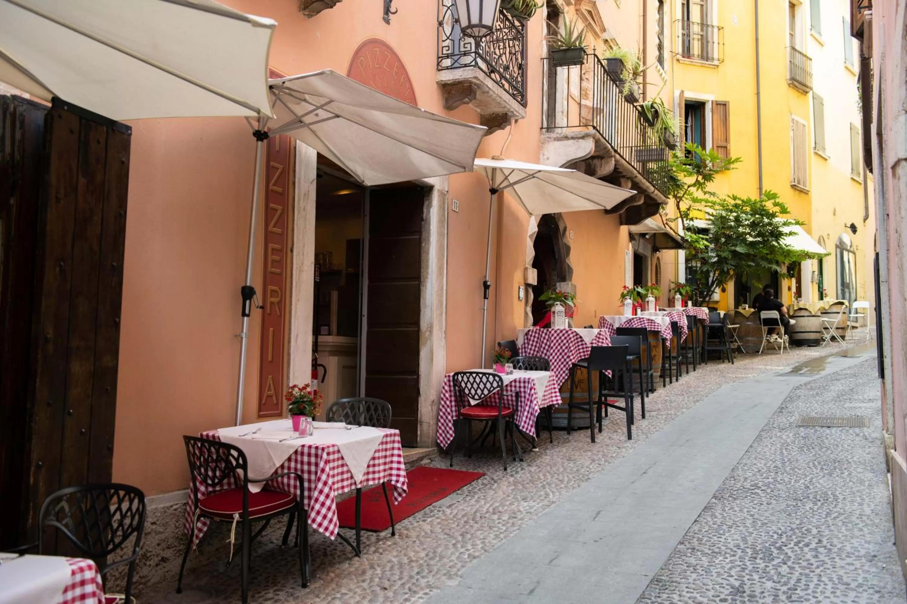 Property building in Alessi Hotel Trattoria