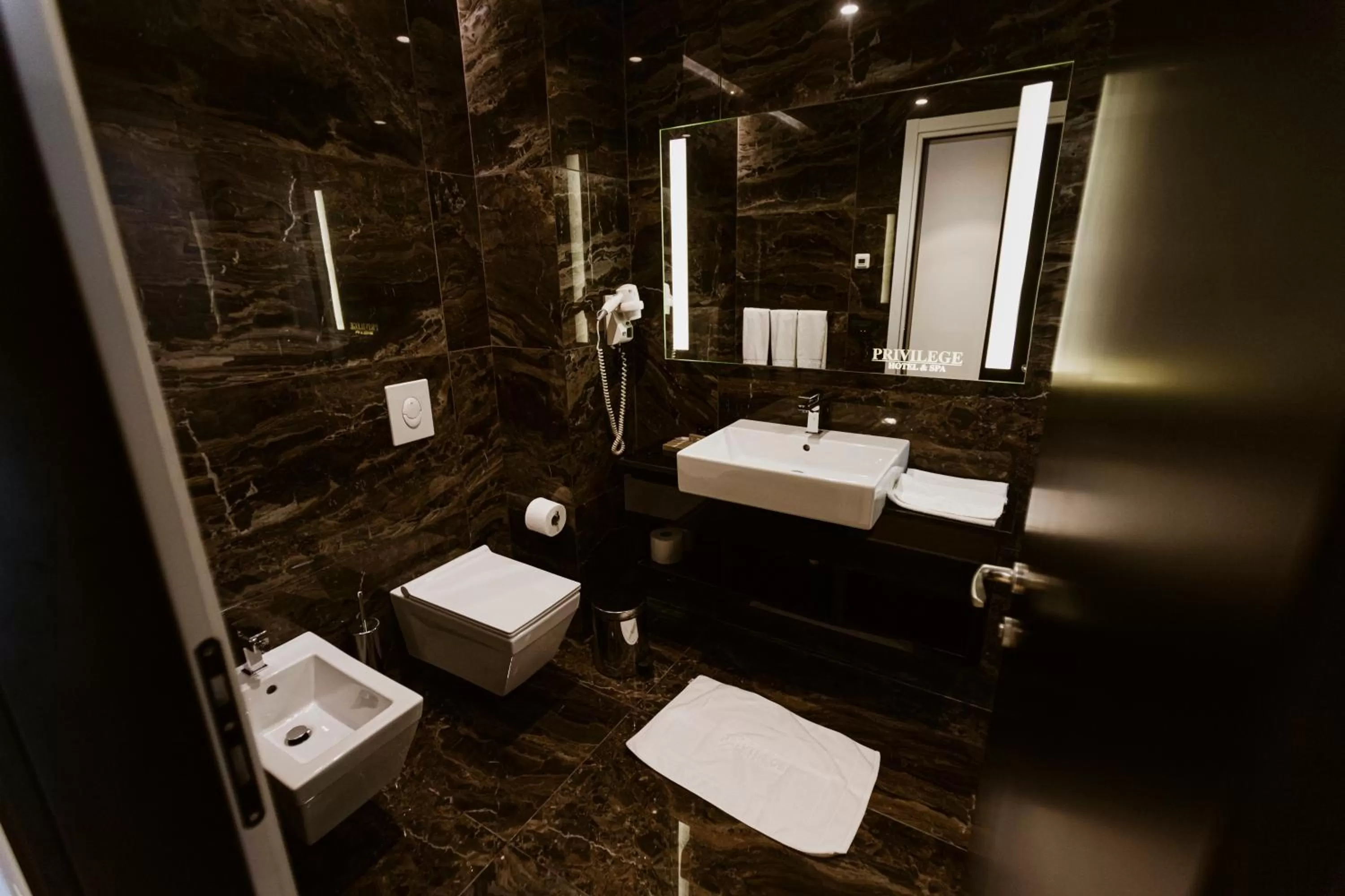 Toilet in Privilege Hotel & Spa