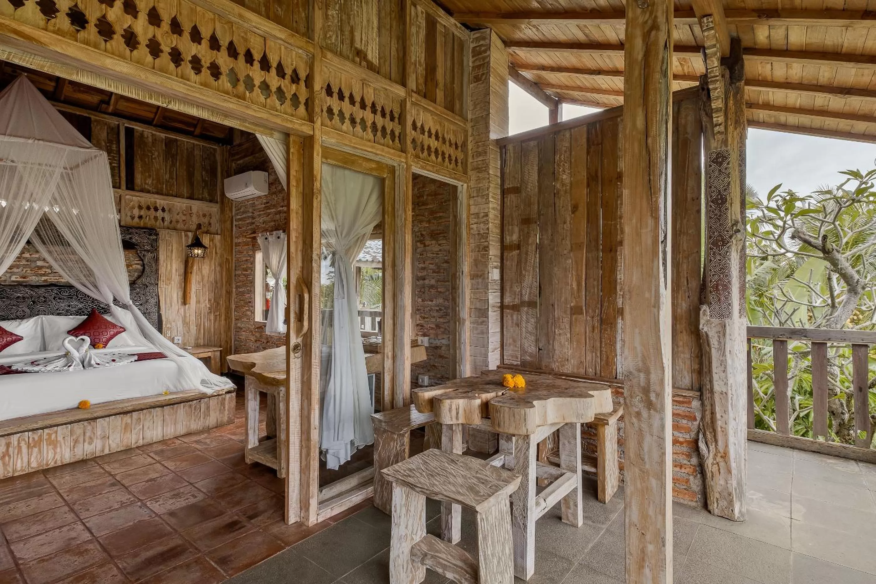 Bed in Joglo Organik Guesthouse