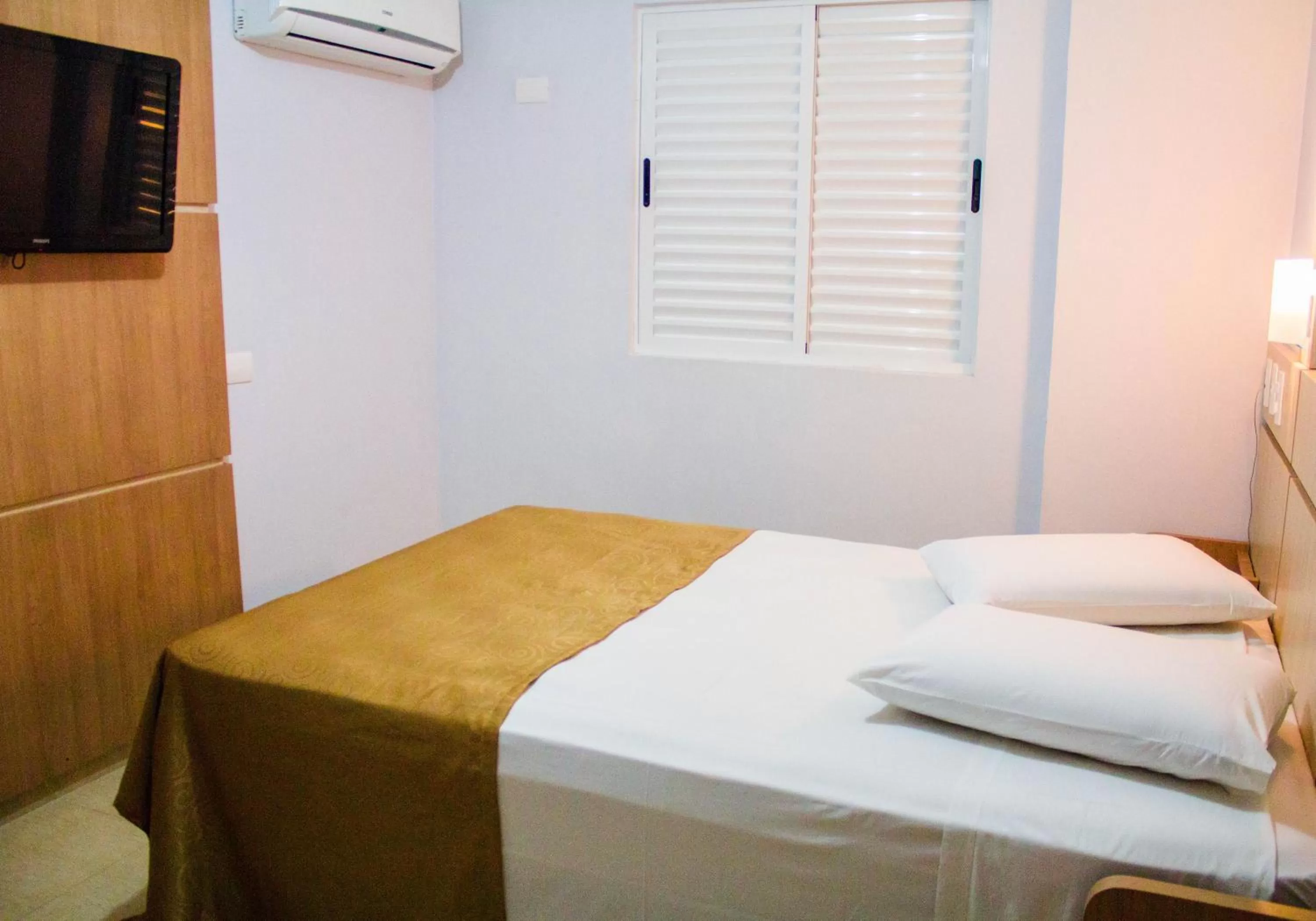 Bed in Hotel Baviera Iguassu