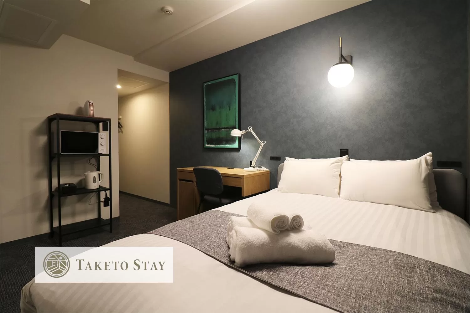 Bed in TAKETO STAY PREMIERE SAPPORO Eki