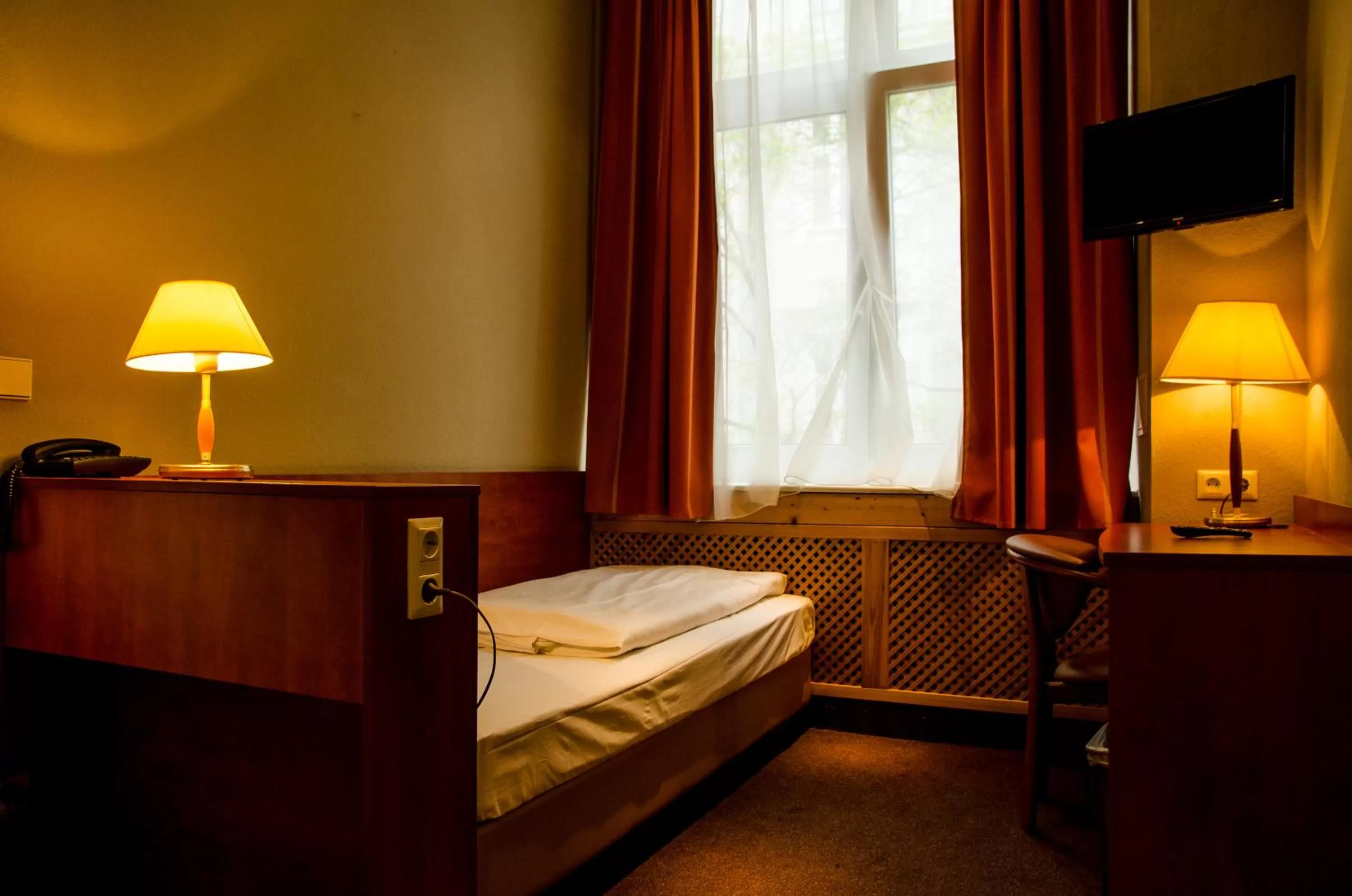 Bed in Hotel Astrid am Kurfürstendamm