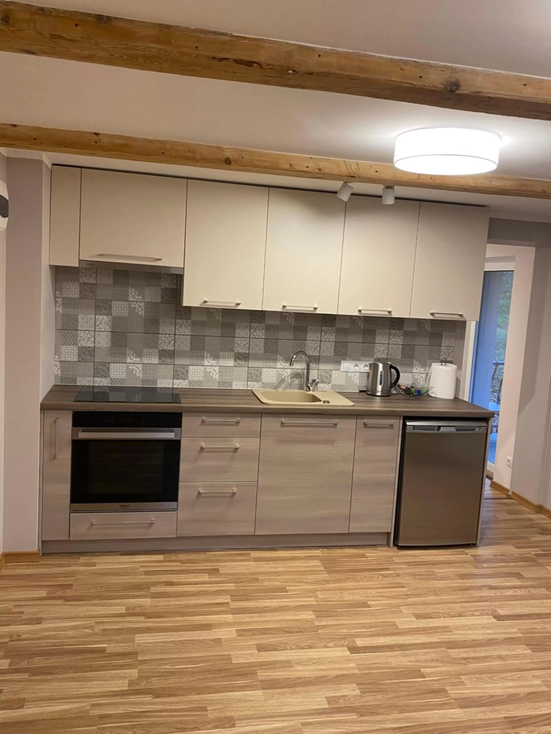 Kitchen or kitchenette in Saules iela 2A