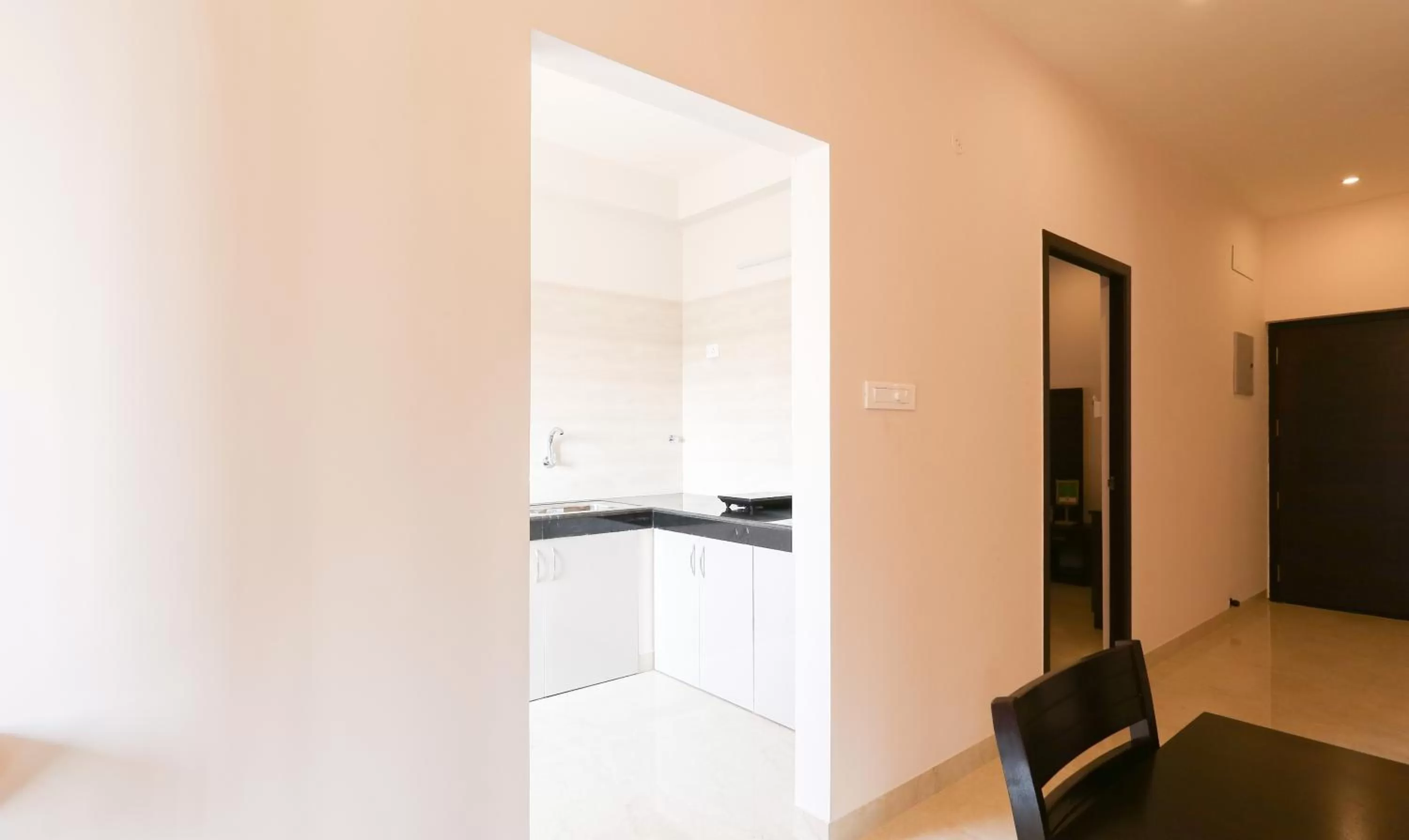 kitchen in Treebo Hi Line Apartments Kalapatti