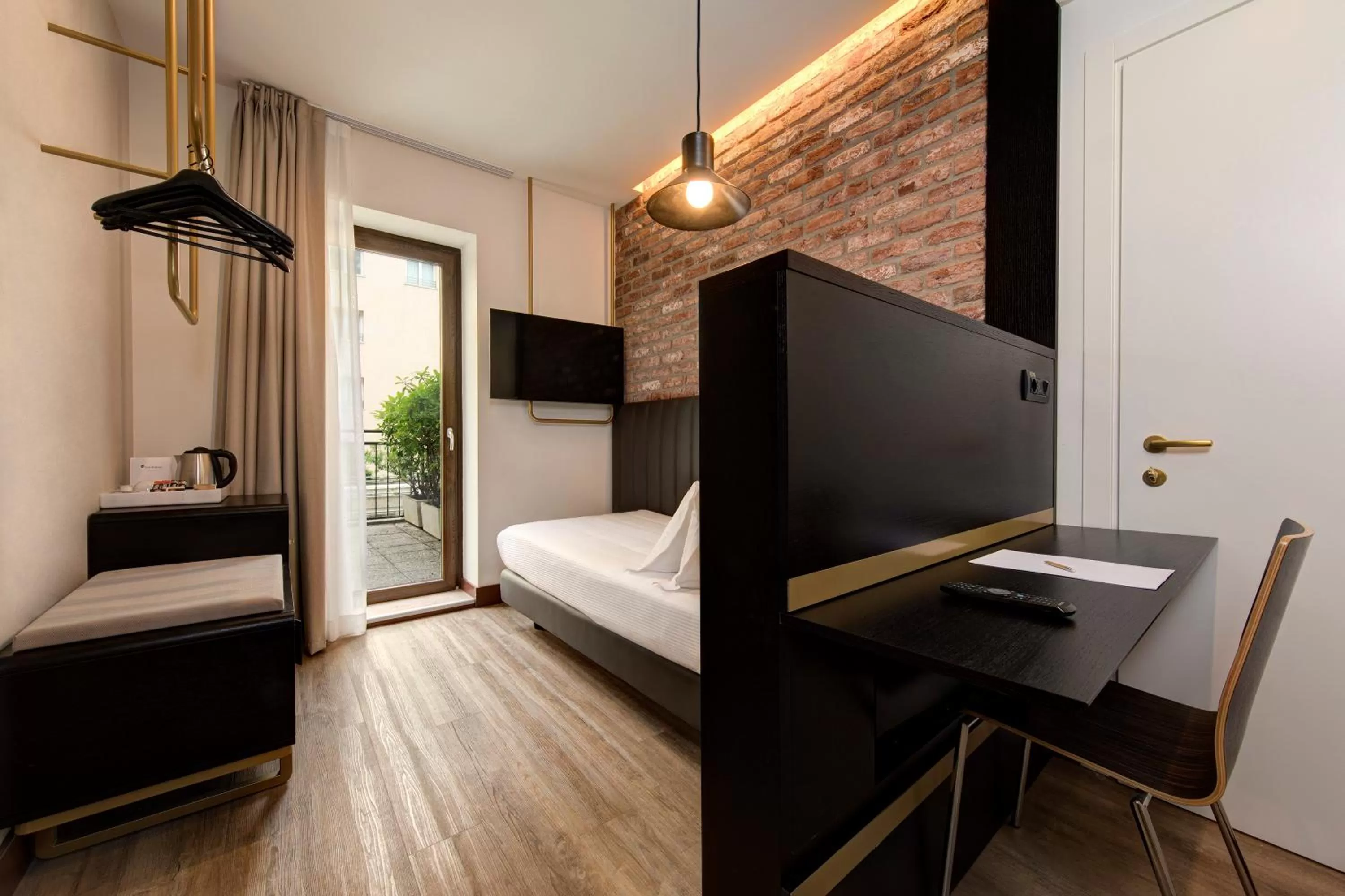 Photo of the whole room, Bed in Best Western Hotel Tritone