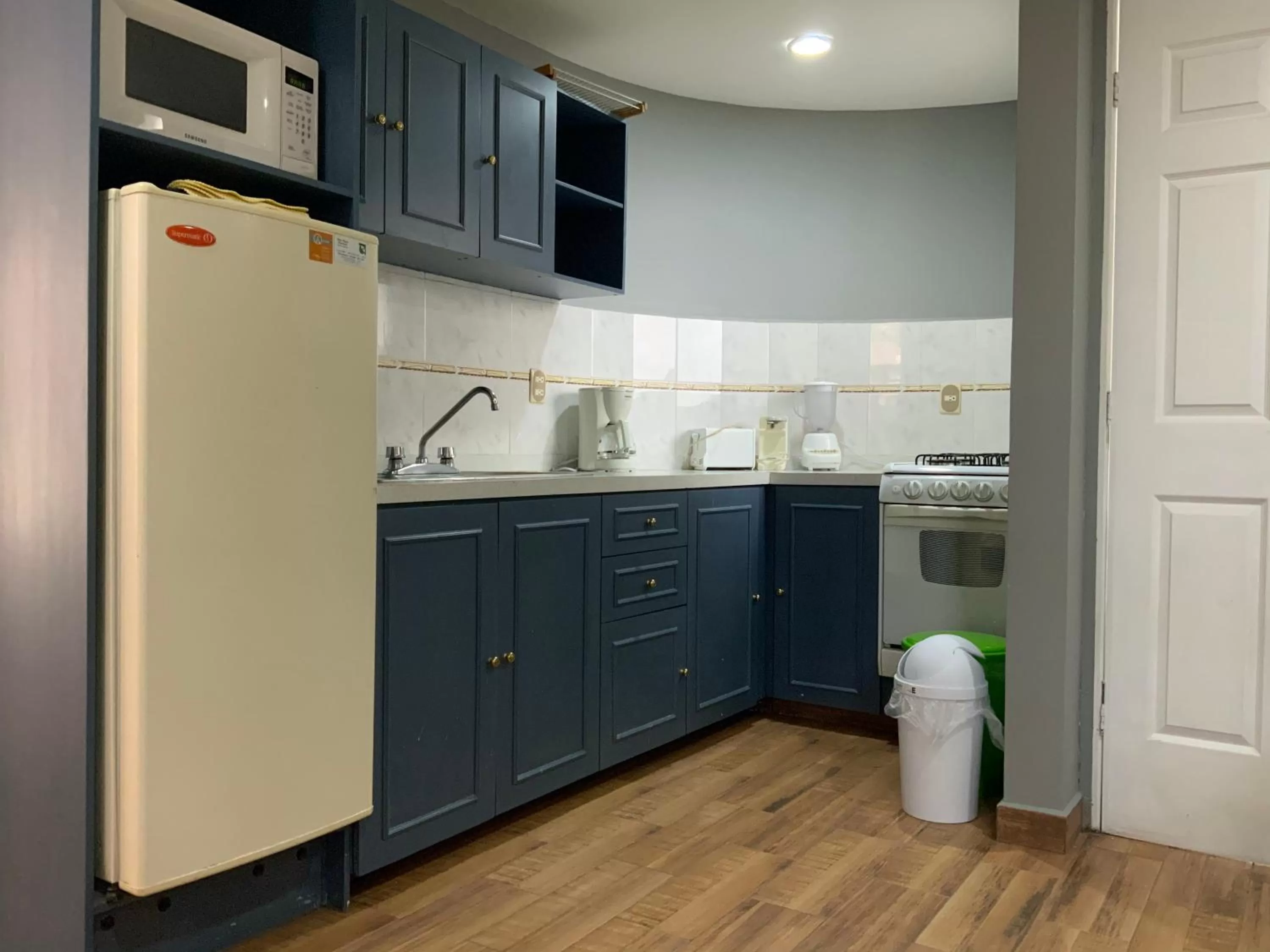 kitchen in Grupo Kings Suites - Bosques de Duraznos 78