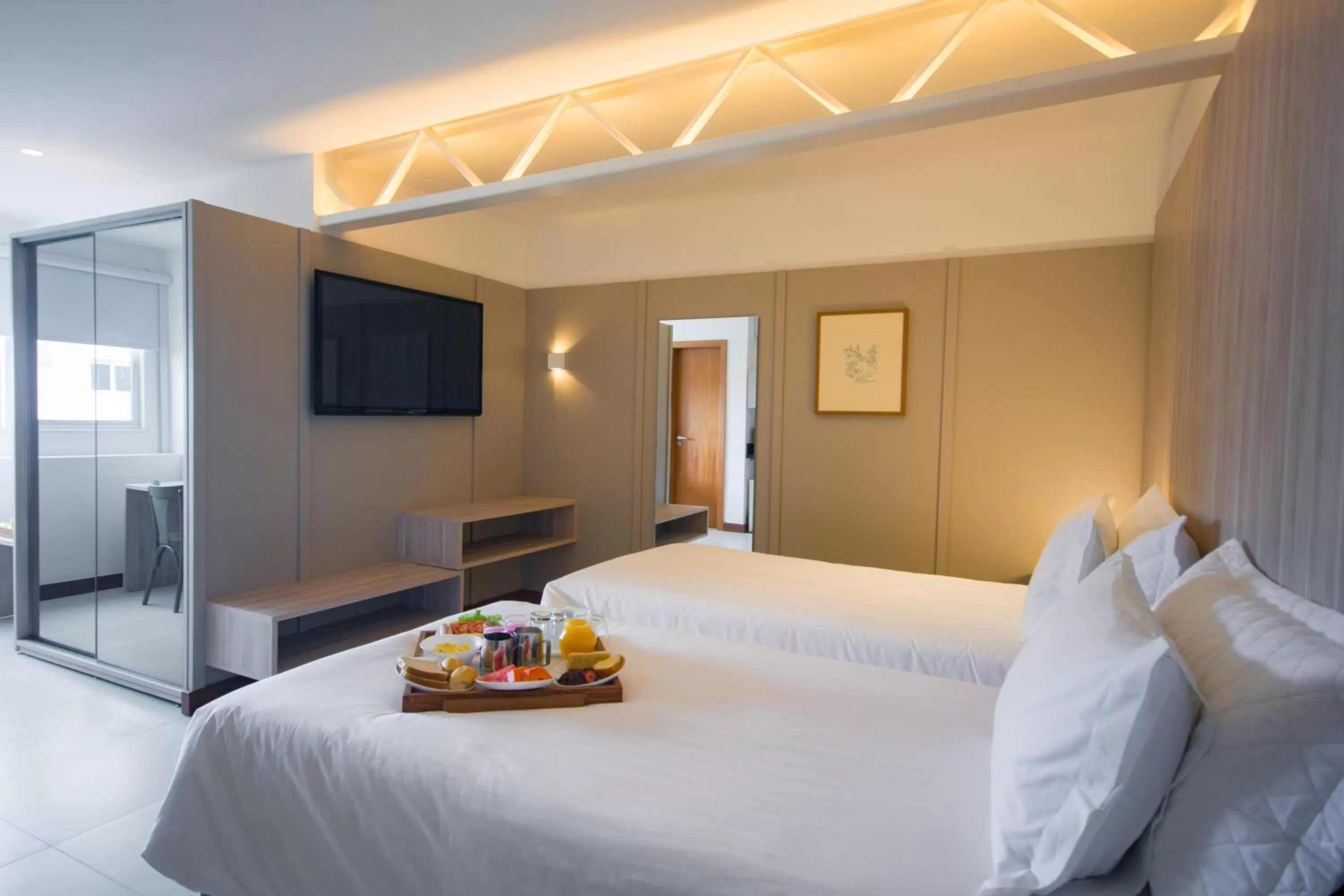 Bed in Malibu Plaza Hotel