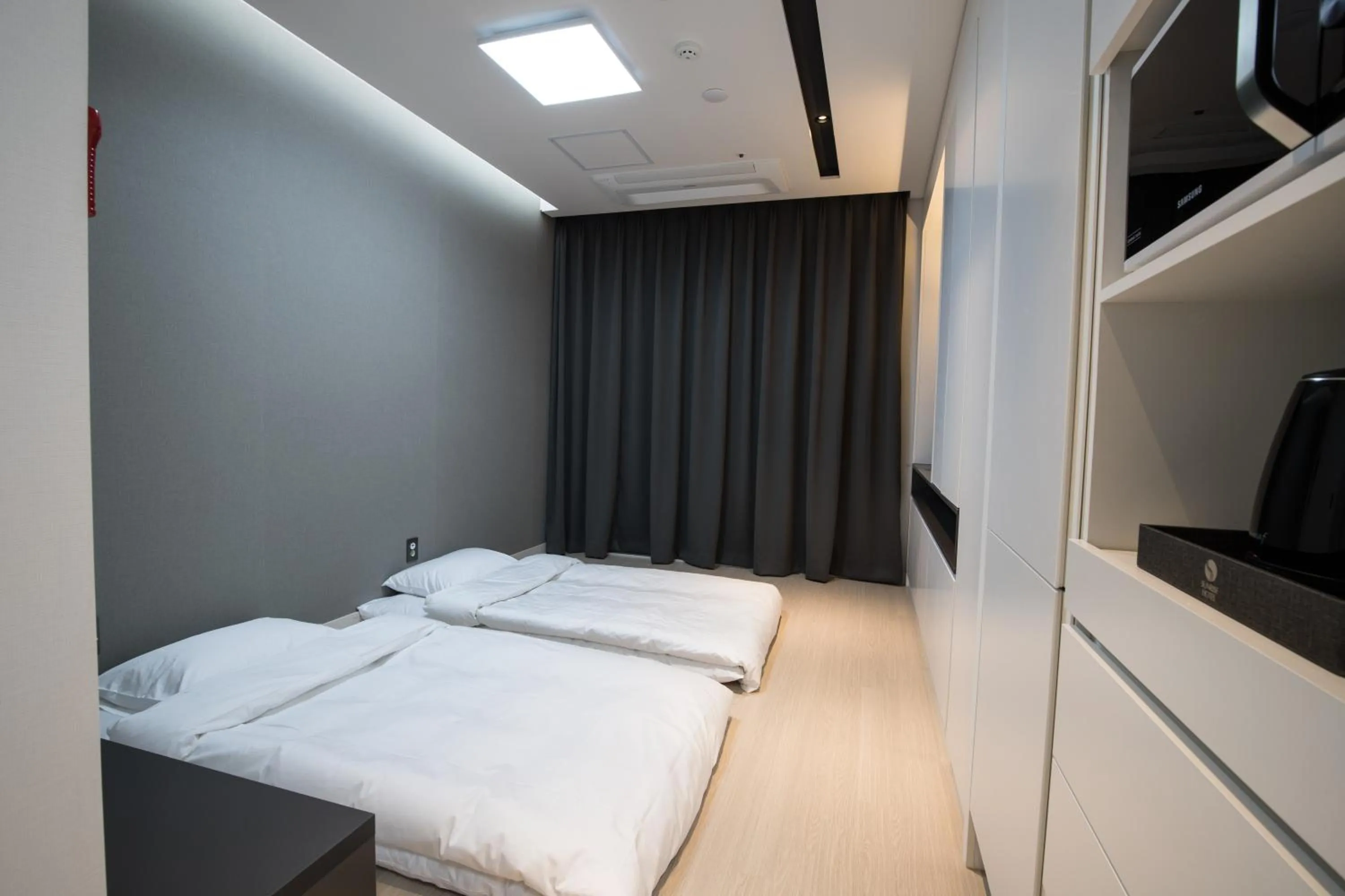 Bed in Sunrise Hotel Sokcho