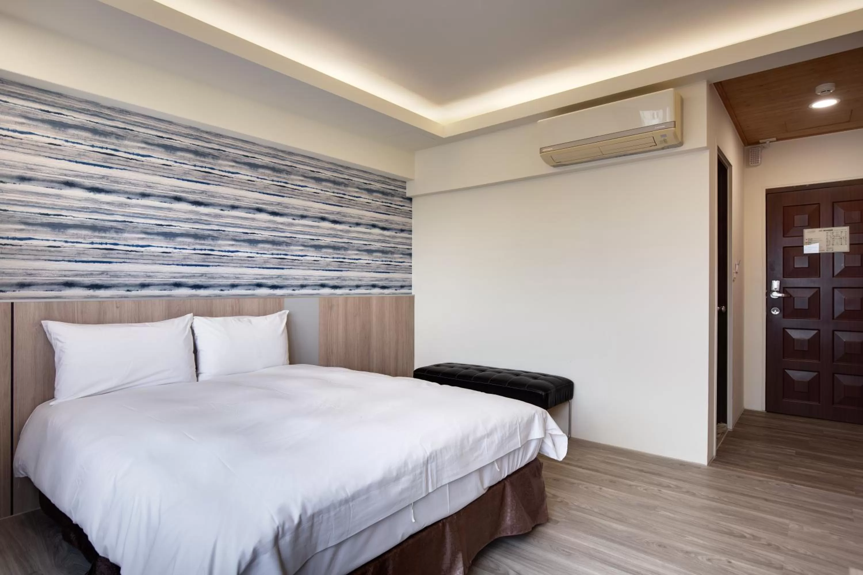 Bed in 天璽商務飯店 Cullinan Hotel