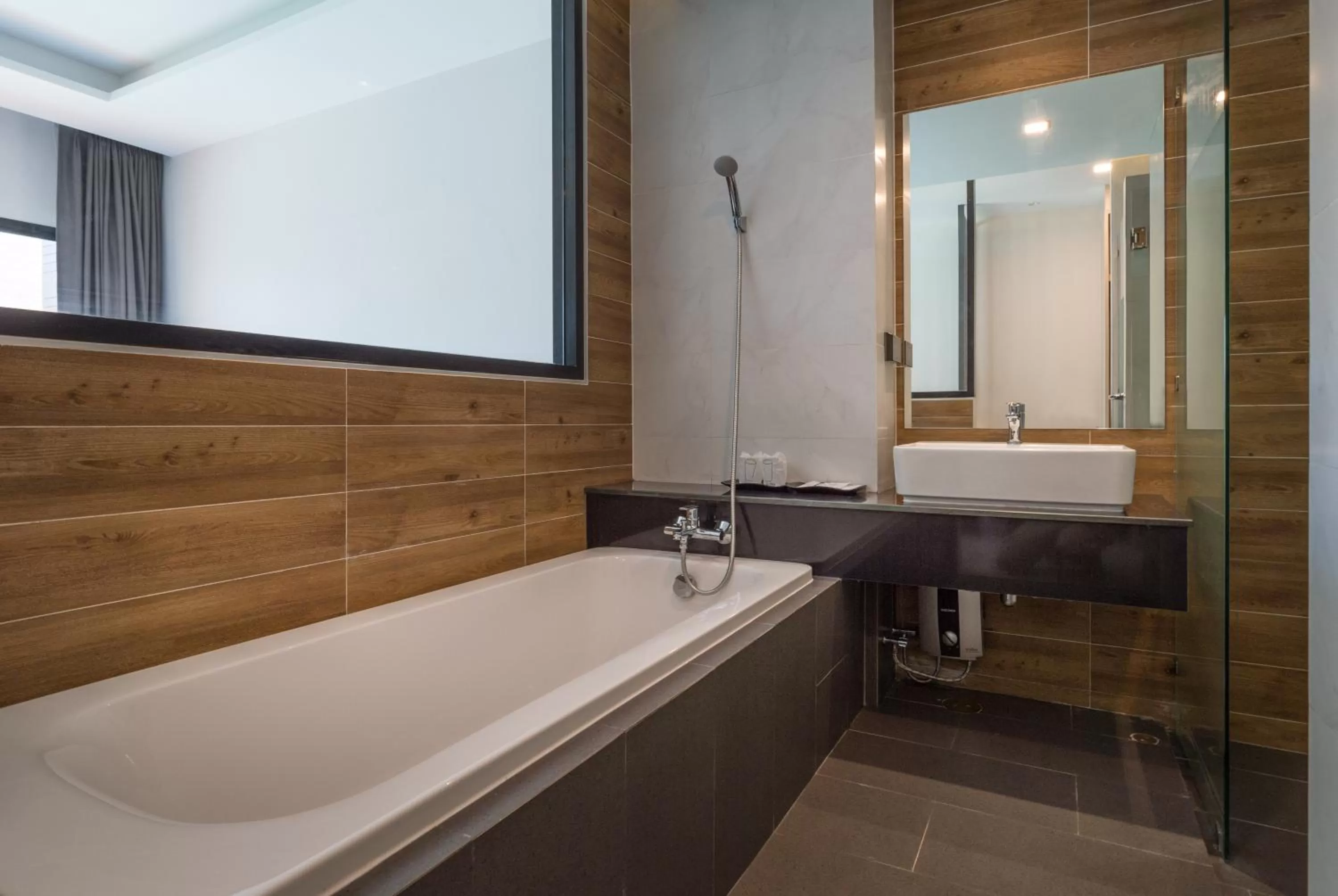 Shower in Cher​mantra​ Aonang​ Resort & Pool​ Suite