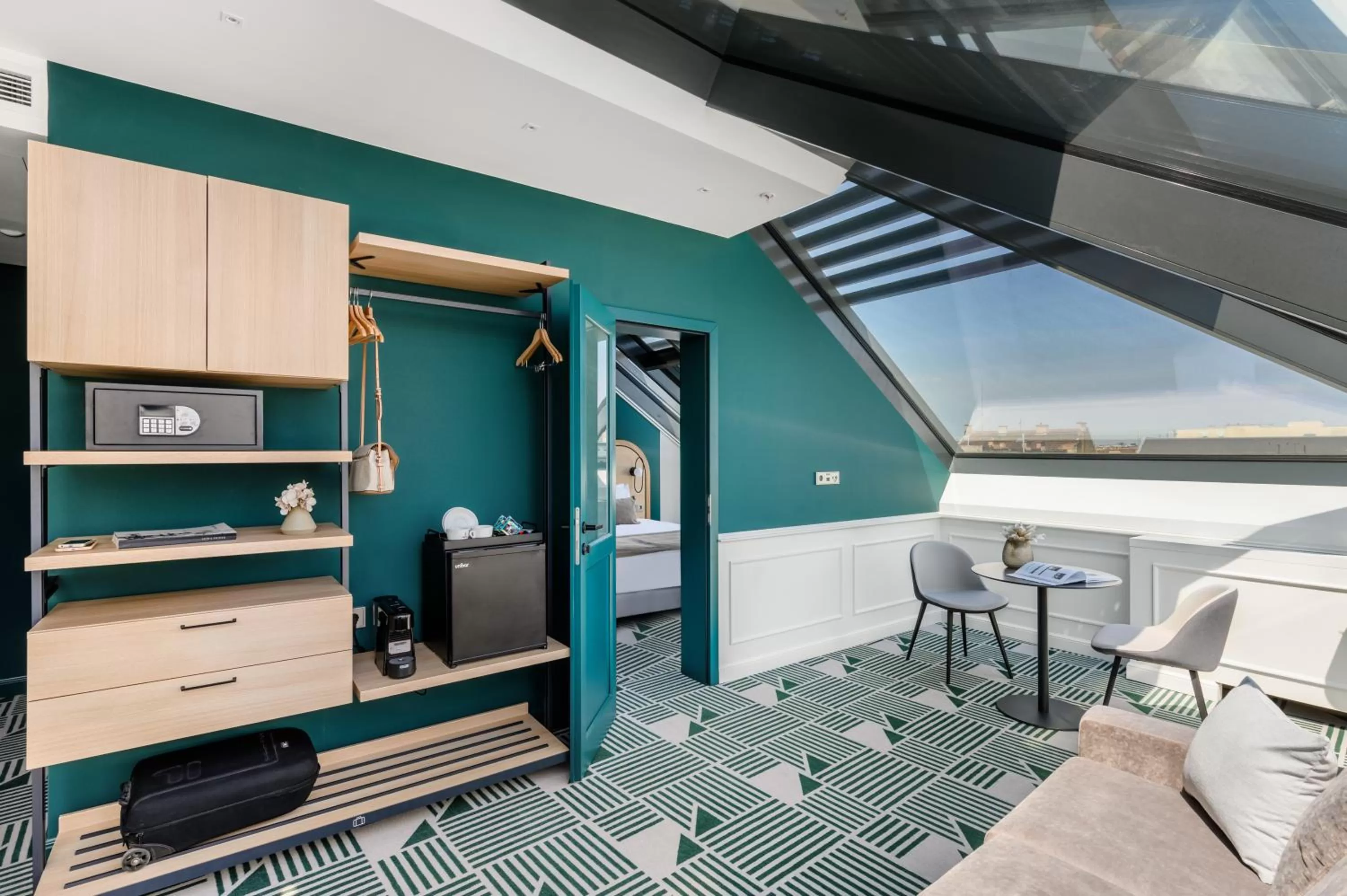 Seating area in Hotel Oktogon Haggenmacher by Continental Group